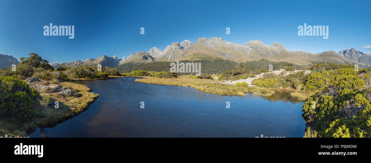 Mountain lake at Key Summit, mountain range of Fiordland National Park, Southland, New Zealand Stock Photo