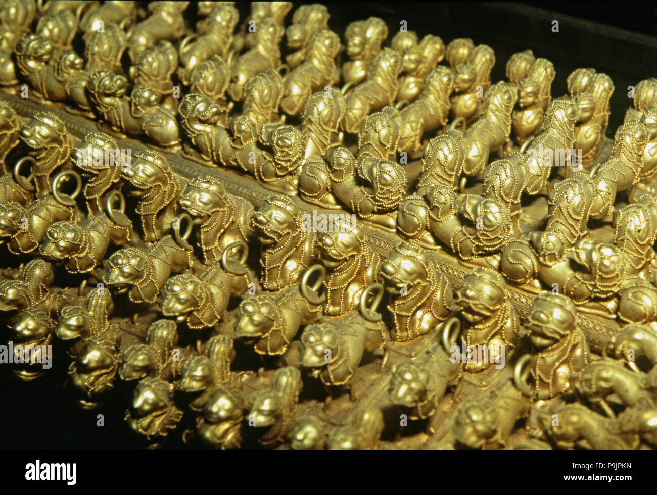 Gold chest late with zoomorphic round shaped, detail. Stock Photo