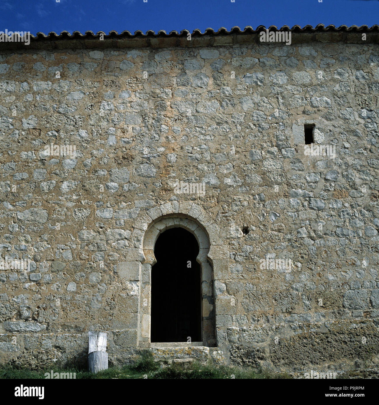 Detail of the front door with a horseshoe arch of the chapel of San Baudelio de Berlanga. Stock Photo