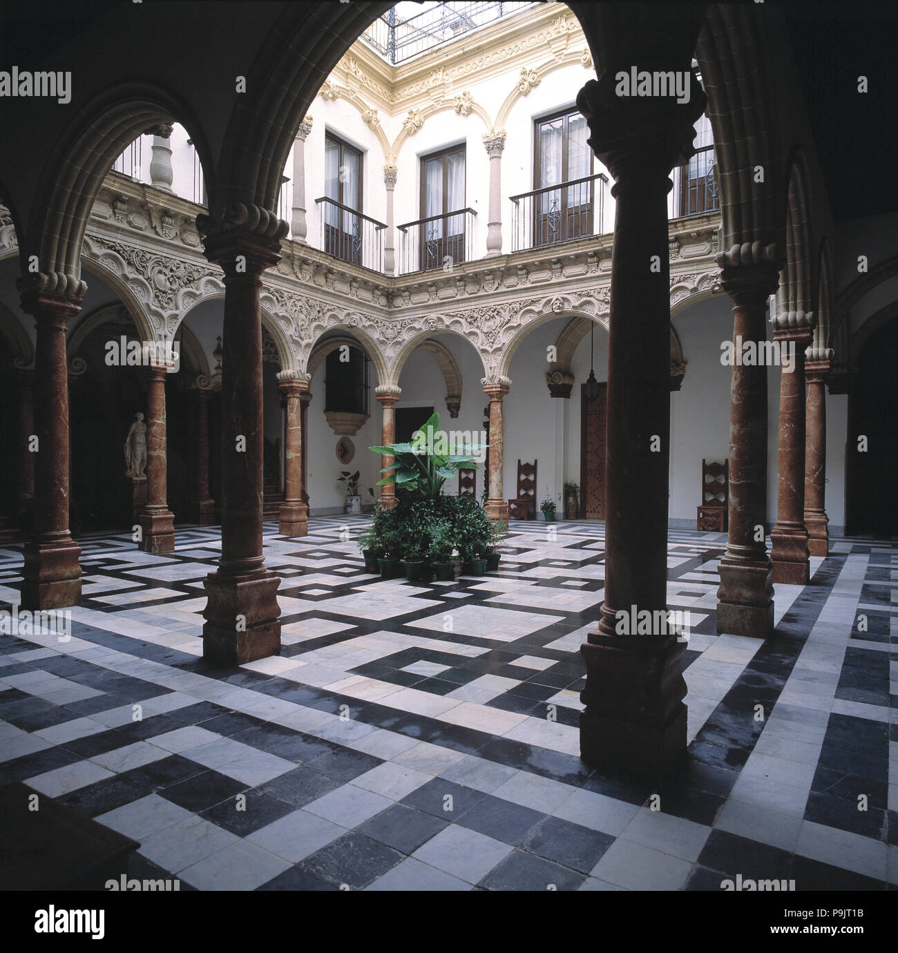 View of the arcaded interior courtyard in the palace of the Marquis of Domecq, project by Antonio… Stock Photo