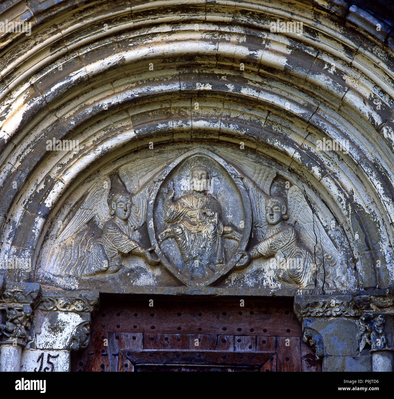 Church of Our Lady of Baldos in Montañana (Huesca), detail of main portal with tympanum carved wi… Stock Photo