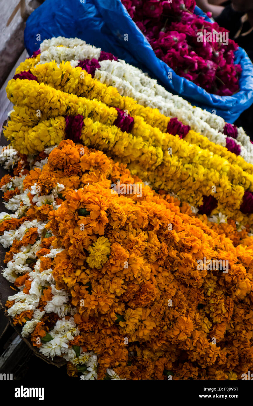 Indian flower garlands for sale in a market in India Stock Photo