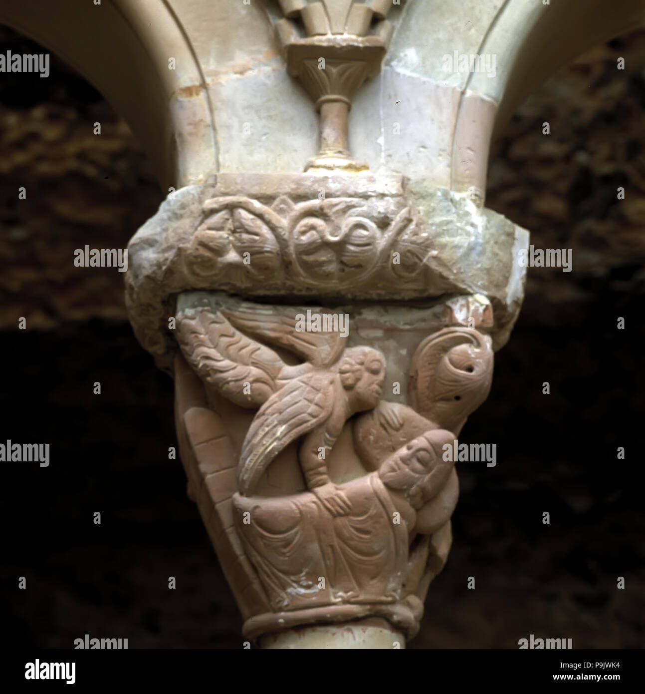 Detail of a capital representing 'The Dream of St. Joseph' in the cloister of the monastery of Sa… Stock Photo