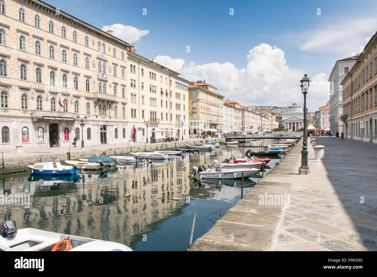 Europe, Italy, Trieste - Calm aftrenoon at Canale Grande, motorboats parked, tourist walking around and sightseeing. Stock Photo