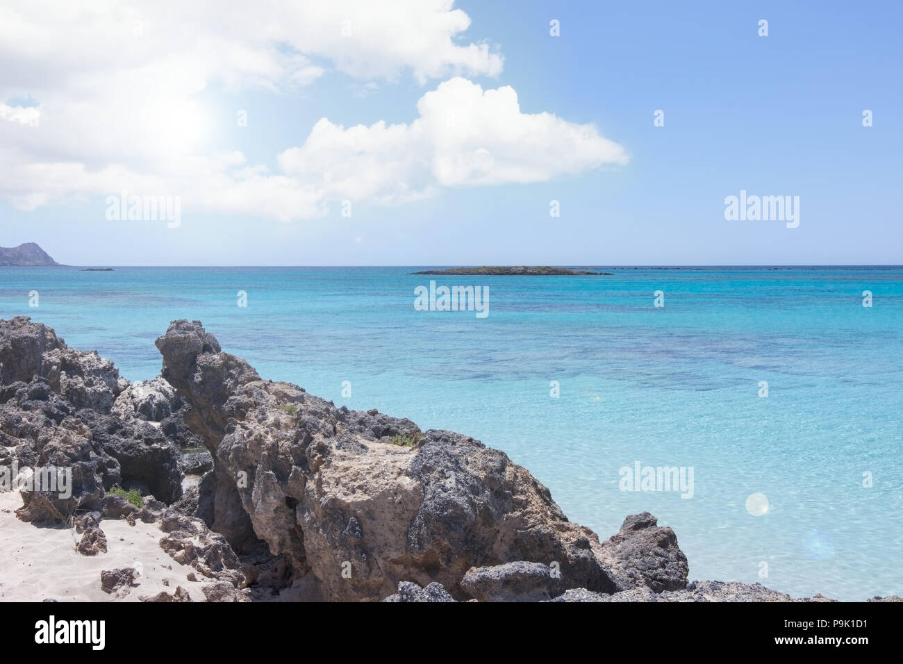 Landscape with seaside beach rocks and turquoise clear water, in summer Stock Photo