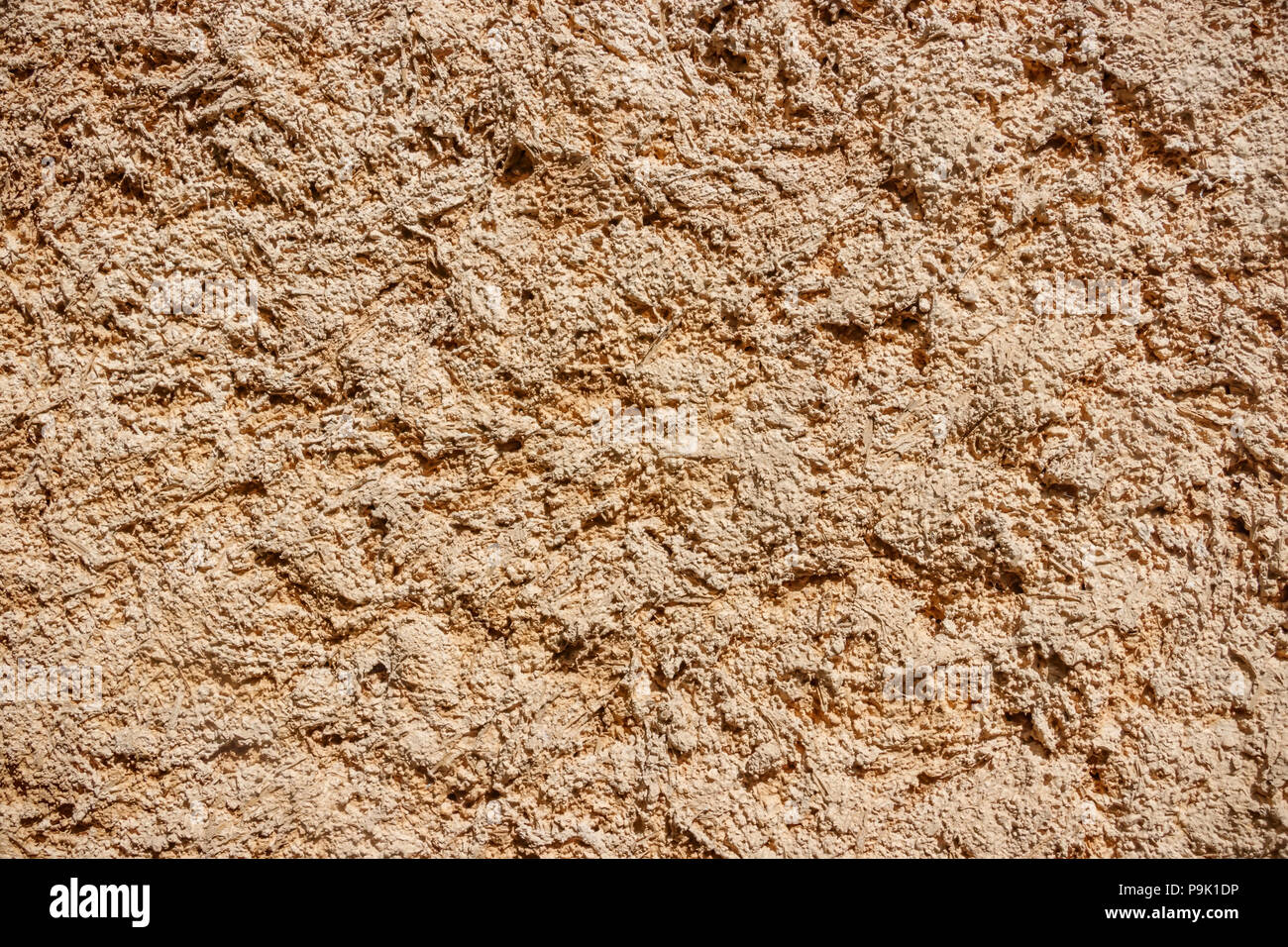 Wall covered with brown clay Stock Photo