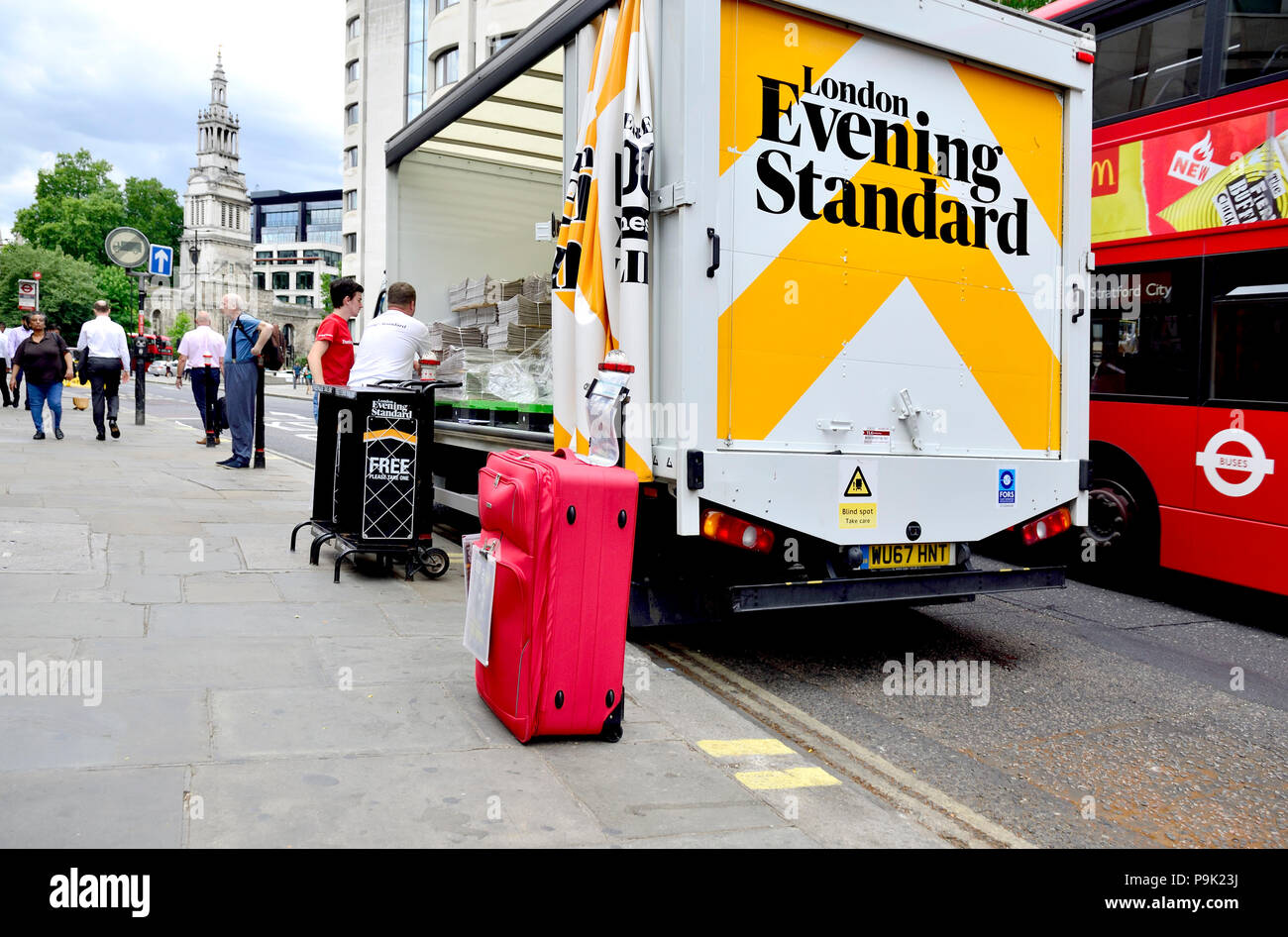 London Evening Standard (newspaper) van being unloaded near St Paul's Cathedral, London, England, UK. Stock Photo