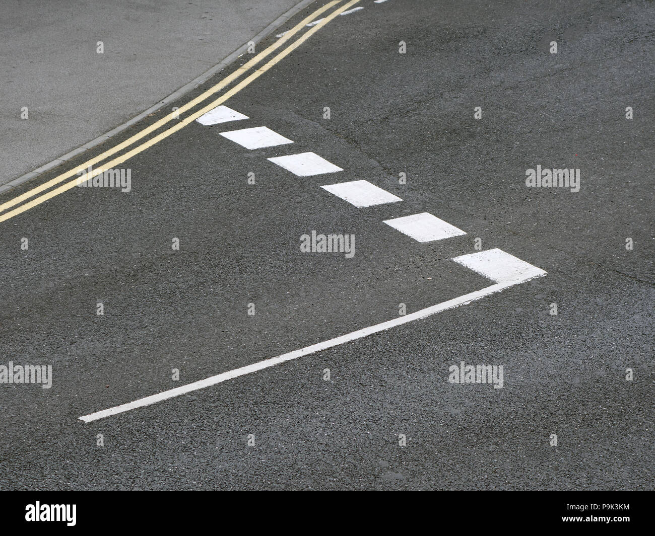 looking down from above to the give way road markings from above and to