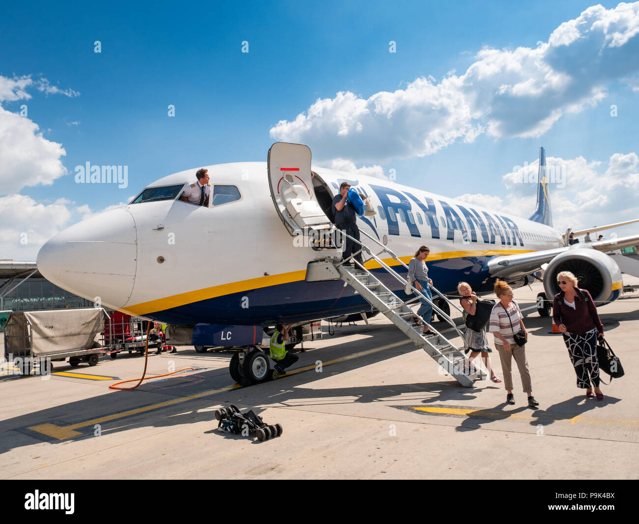 Passengers disembarking from a Ryanair plane at Stansted airport, UK Stock Photo