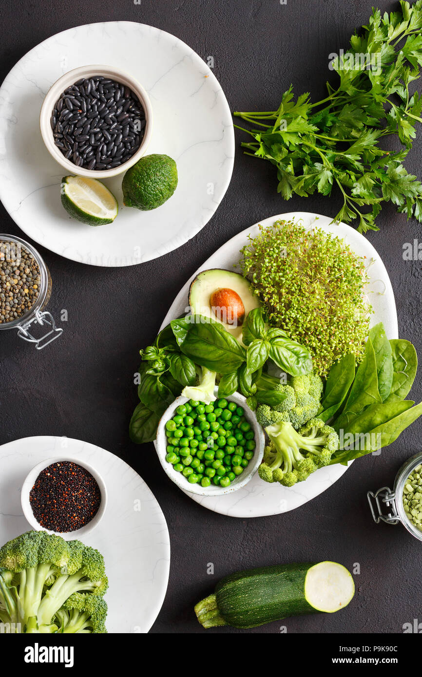 Set healthy food source of protein for vegetarians: lucerne, zucchini, spinach, basil, green peas, avocado, broccoli, lime, quinoa, black beans and gr Stock Photo