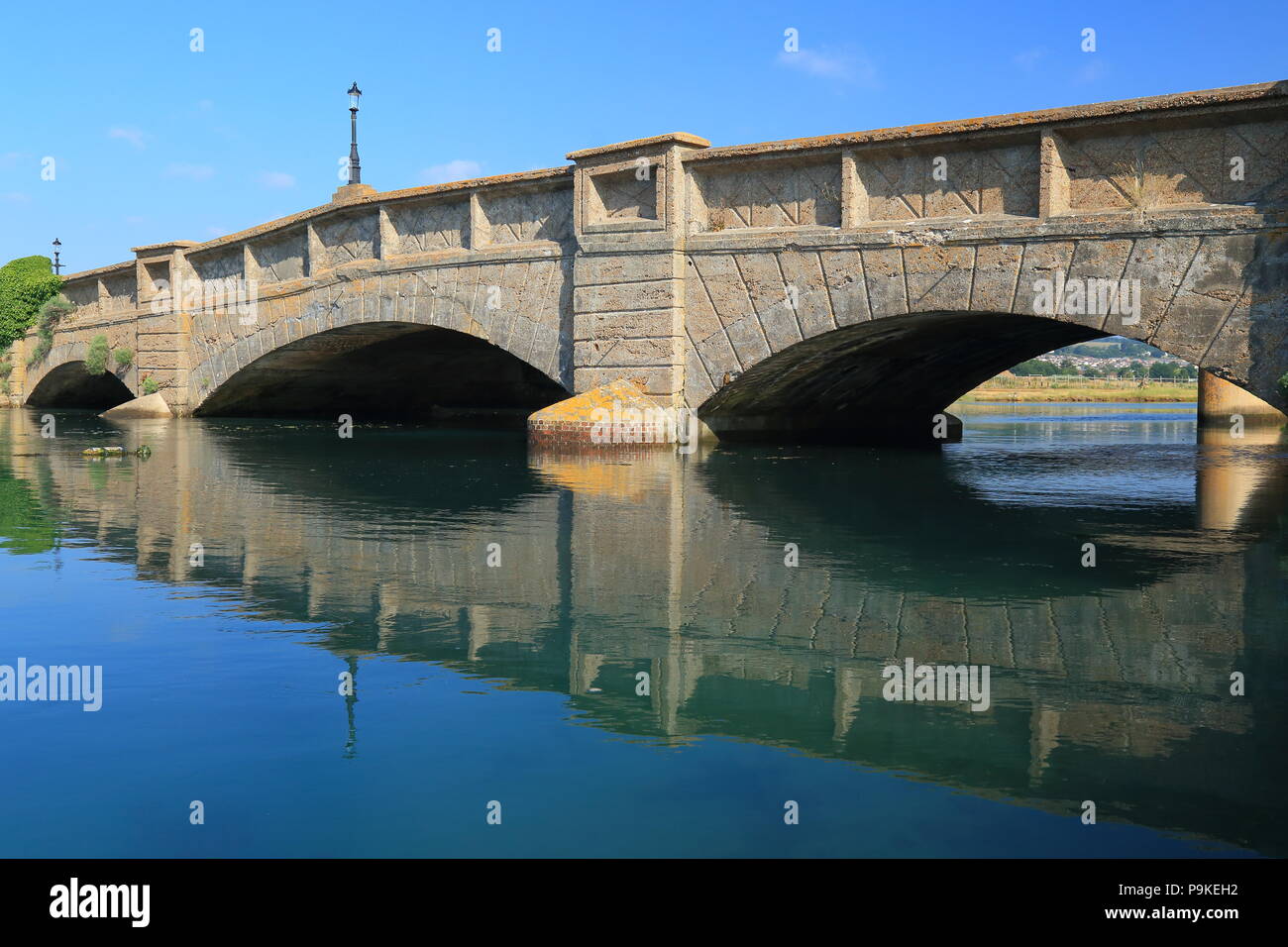 Axmouth Bridge in East Devon is the oldest concrete bridge in Britain,  built over the River Axe in 1877 Stock Photo