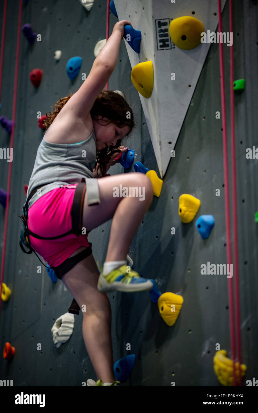 Young woman rock climbing girl hires stock photography and images Alamy