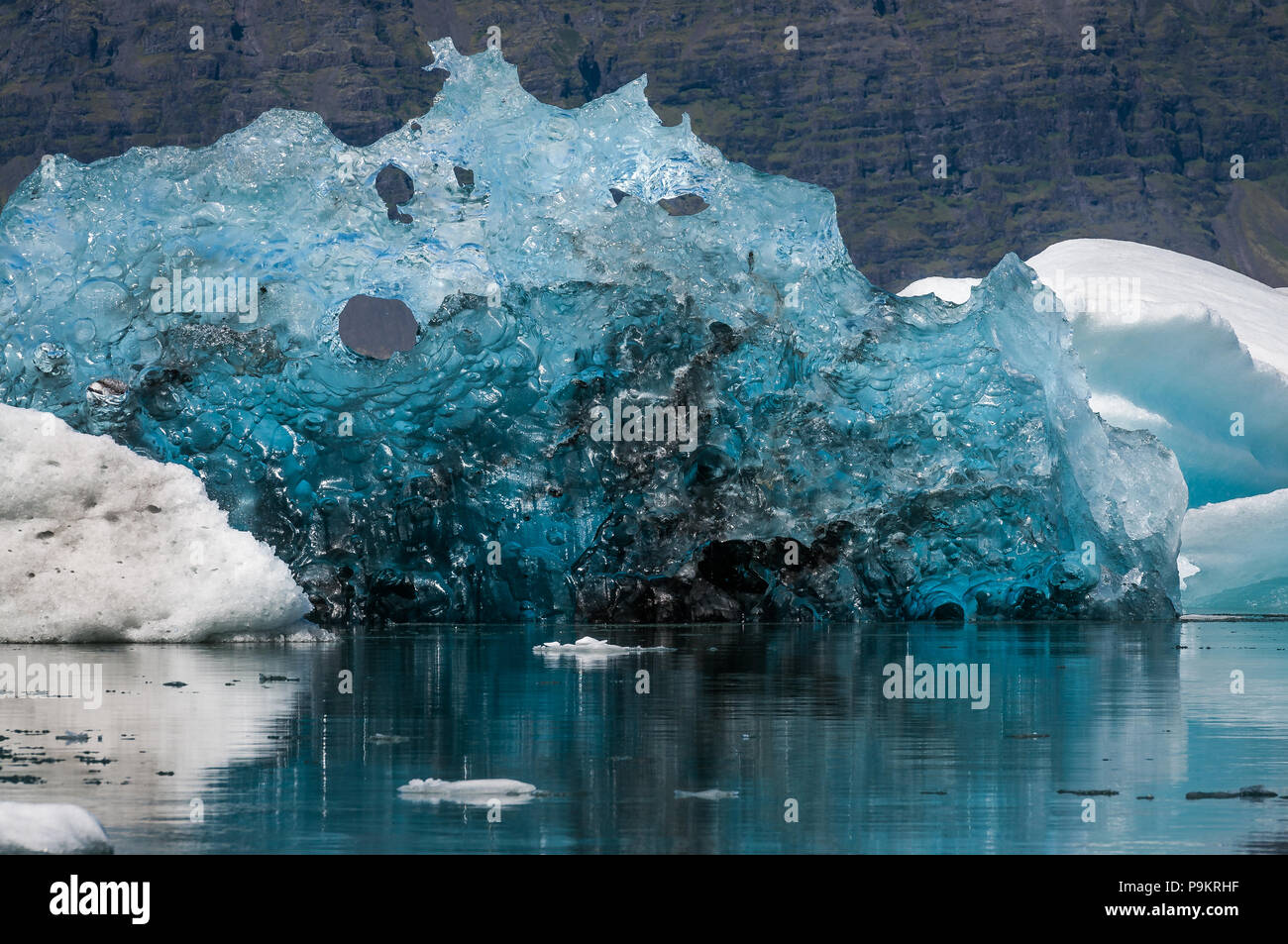 Detail of a recently flipped iceberg on Jökulsárlón (Glacier River Lagoon) during a sunny day, Iceland Stock Photo