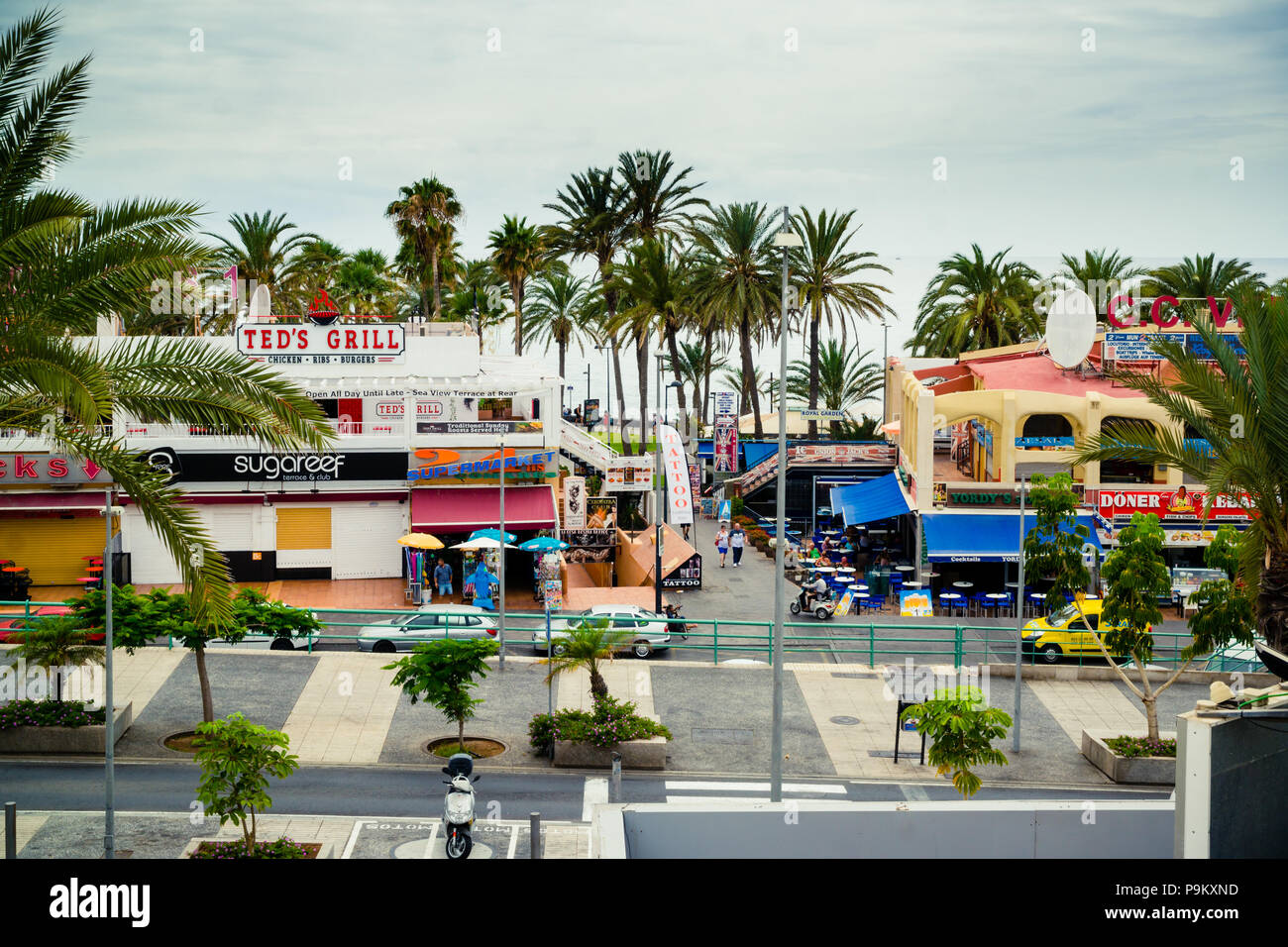 Daytime view from Stringfellows over Veronica's Strip at Playa de las  Americas, Tenerife. Showing bars, clubs, restaurants, shops, tattoo  parlours Stock Photo - Alamy