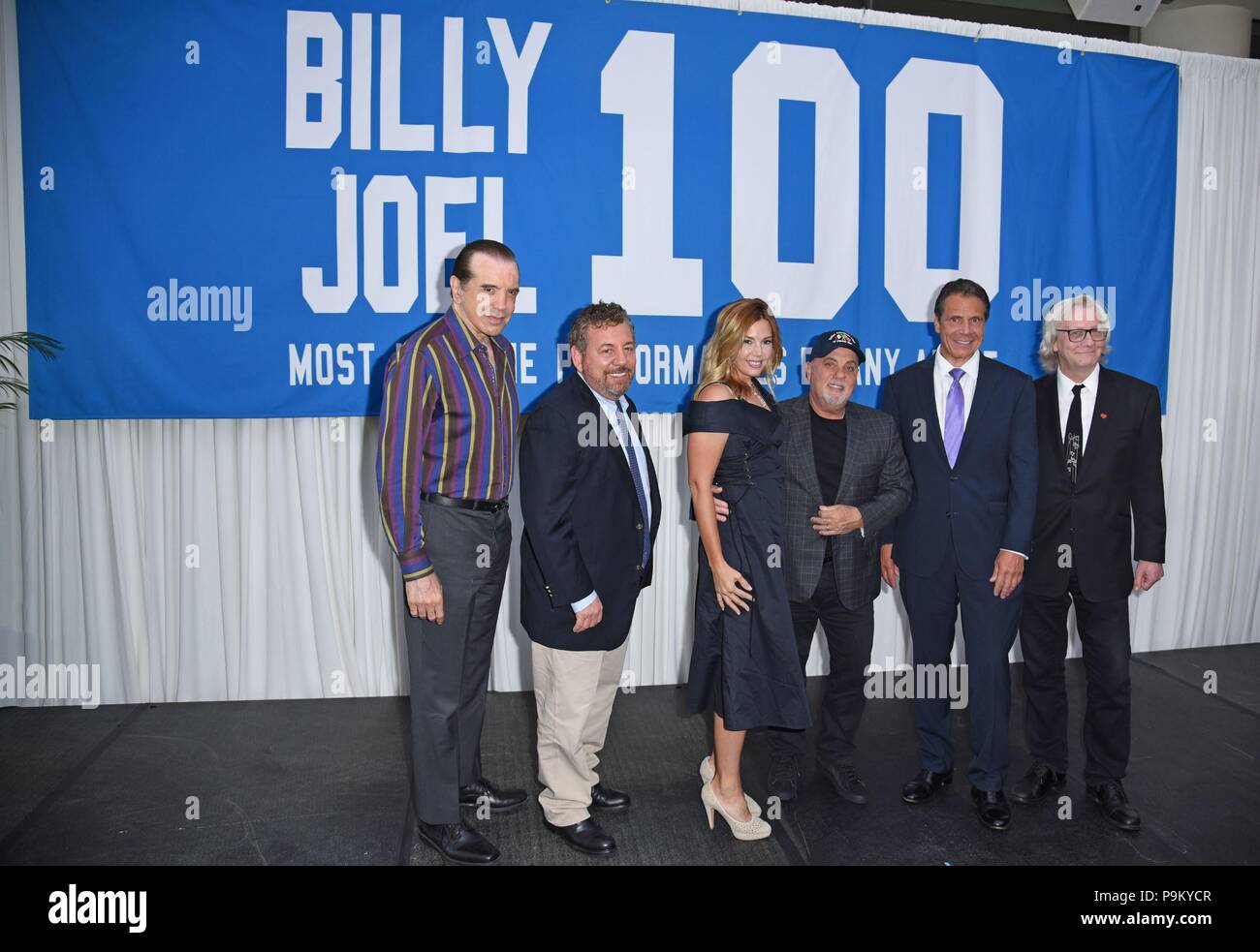 New York, NY, USA. 18th July, 2018. Chazz Palminteri, James L. Dolan, Alexis Roderick, Billy Joel, Governor Andrew M. Cuomo, Jim Kerr at a public appearance for Billy Joel Celebrates 100th Performance at MSG, Madison Square Garden, New York, NY July 18, 2018. Credit: Derek Storm/Everett Collection/Alamy Live News Stock Photo