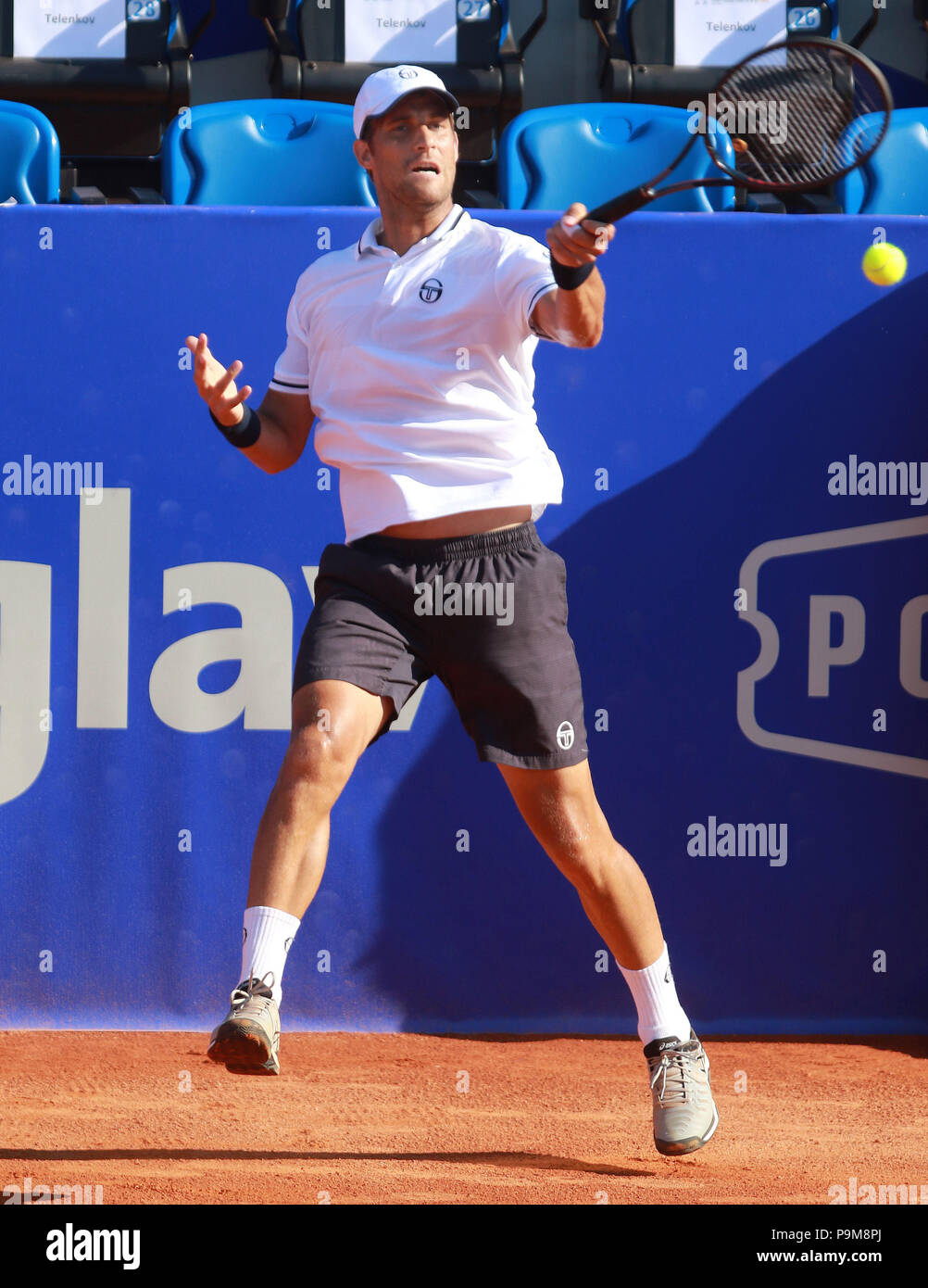 Umag, CROATIA, Umag: Martin Klizan of Slovakia hits a return to Robin Haase of Holland during the singles match Klizan v Haase at the ATP 29th Plava laguna Croatia Open Umag tournament at the at the Goran Ivanisevic ATP Stadium, on July 19, 2018 in Umag. Credit: Andrea Spinelli/Alamy Live News Stock Photo