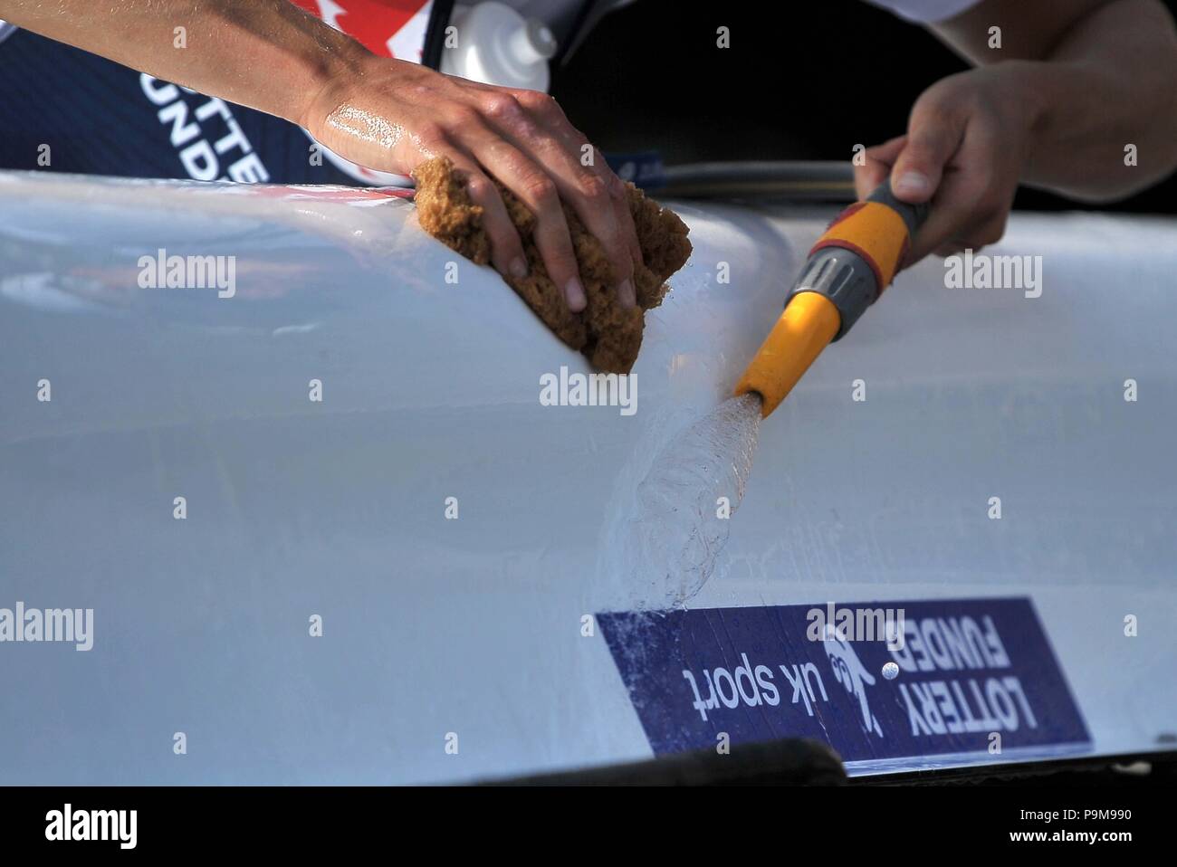 Redgrave Pinsent Rowing Lake, UK. 19th July 2018. Hull cleaning hosepipe and sponge. British rowing announcement of team for the European Championships at Glasgow2018. Redgrave Pinsent Rowing Lake. Berkshire. UK. 19/07/2018. Credit: Sport In Pictures/Alamy Live News Stock Photo