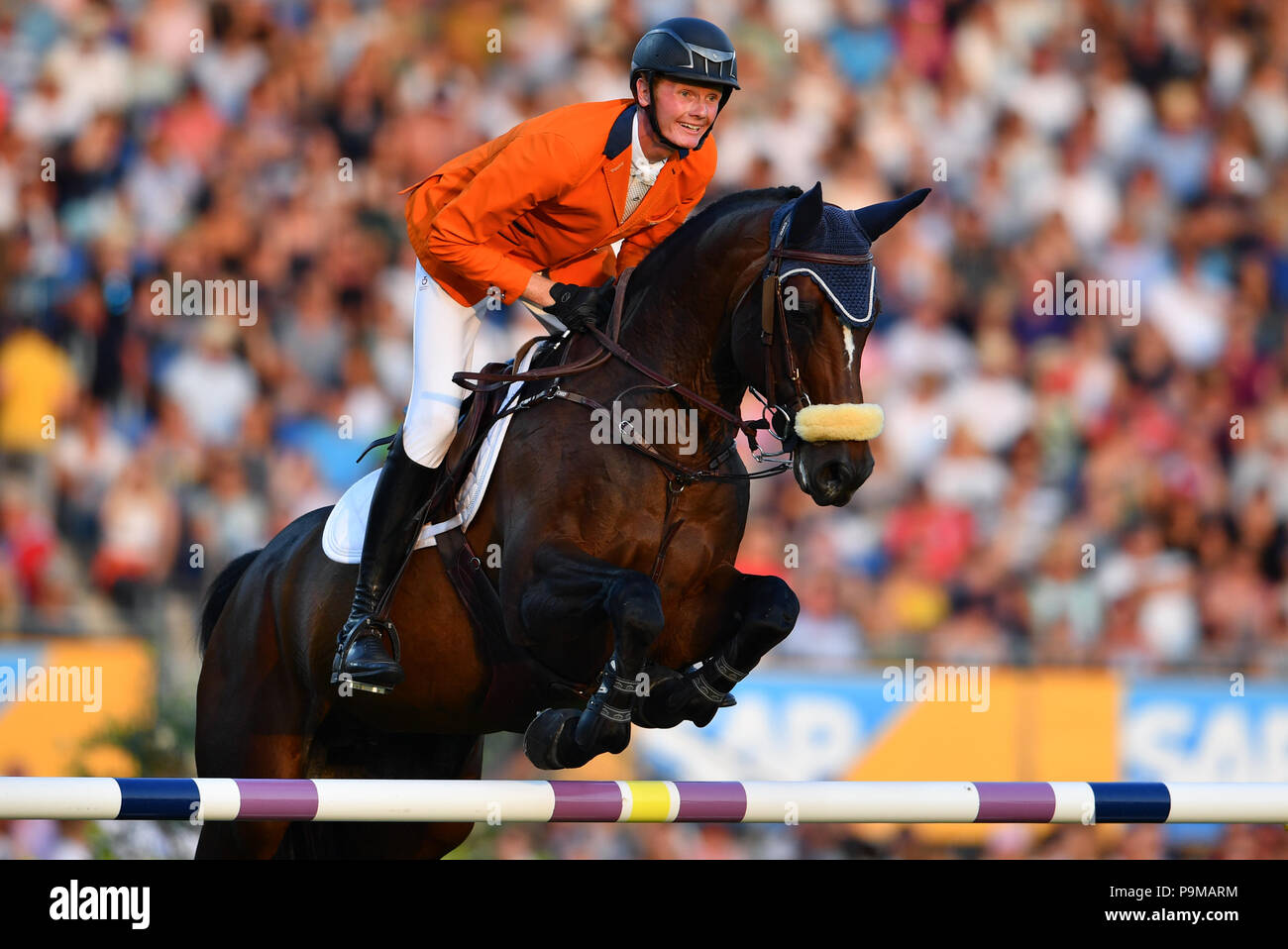 Aachen, Germany. 19th July, 2018. CHIO, equestrian, show jumping. The Dutch  rider Frank Schutter on the horse Chianti's Champion jumping over a  barrier. Credit: Uwe Anspach/dpa/Alamy Live News Stock Photo - Alamy