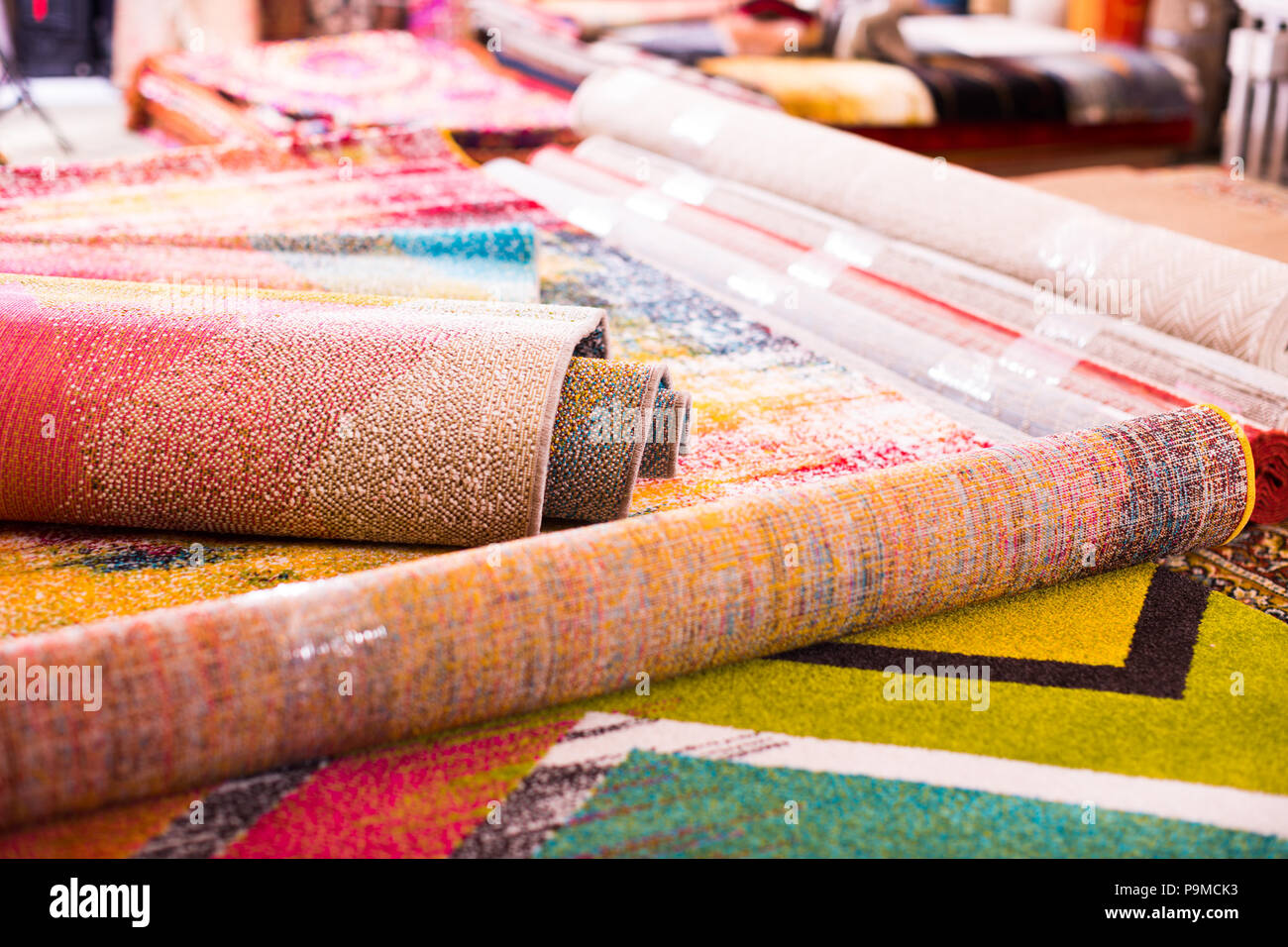 Image of traditional woolen carpets at carpet market, nobody Stock
