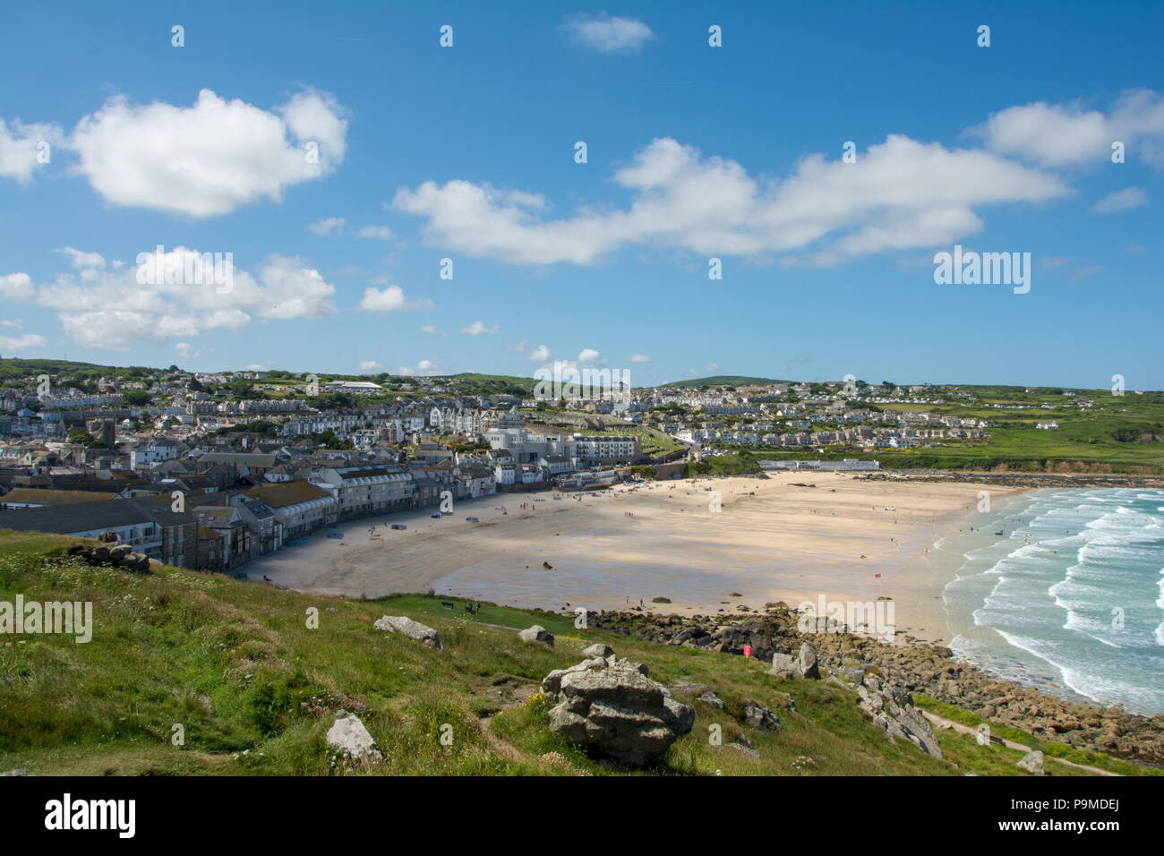 A view of Porthmeor beach from atop Island peninsula in St Ives, Cornwall, UK Stock Photo
