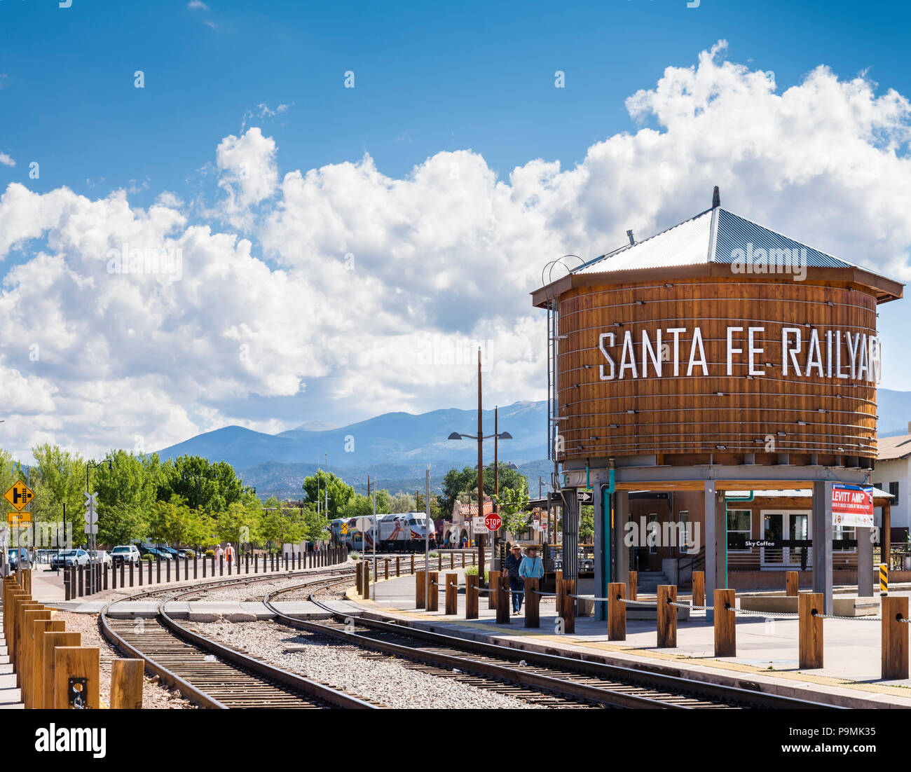 Santa Fe Railyard, Sangre de Cristo mountains and Rail Runner train in Santa Fe New Mexico USA. Stock Photo