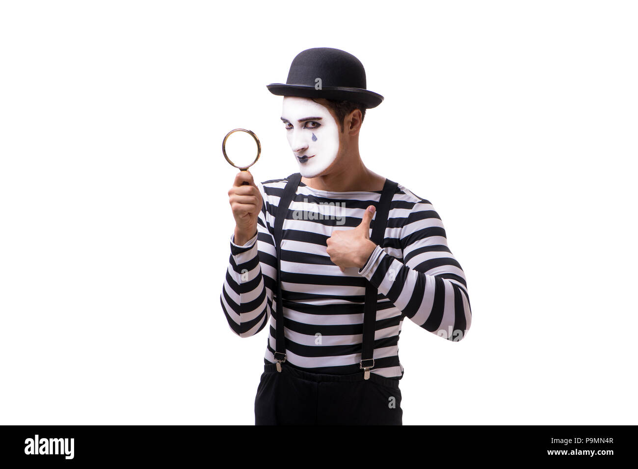 Mime with loupe isolated on white background Stock Photo - Alamy