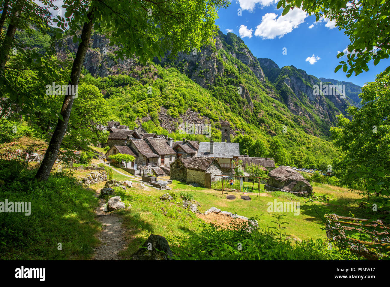 Forogio village with typical stone houses and Swiss Alps, Bavona valley, Canton Ticino, Switzerland, Europe. Stock Photo