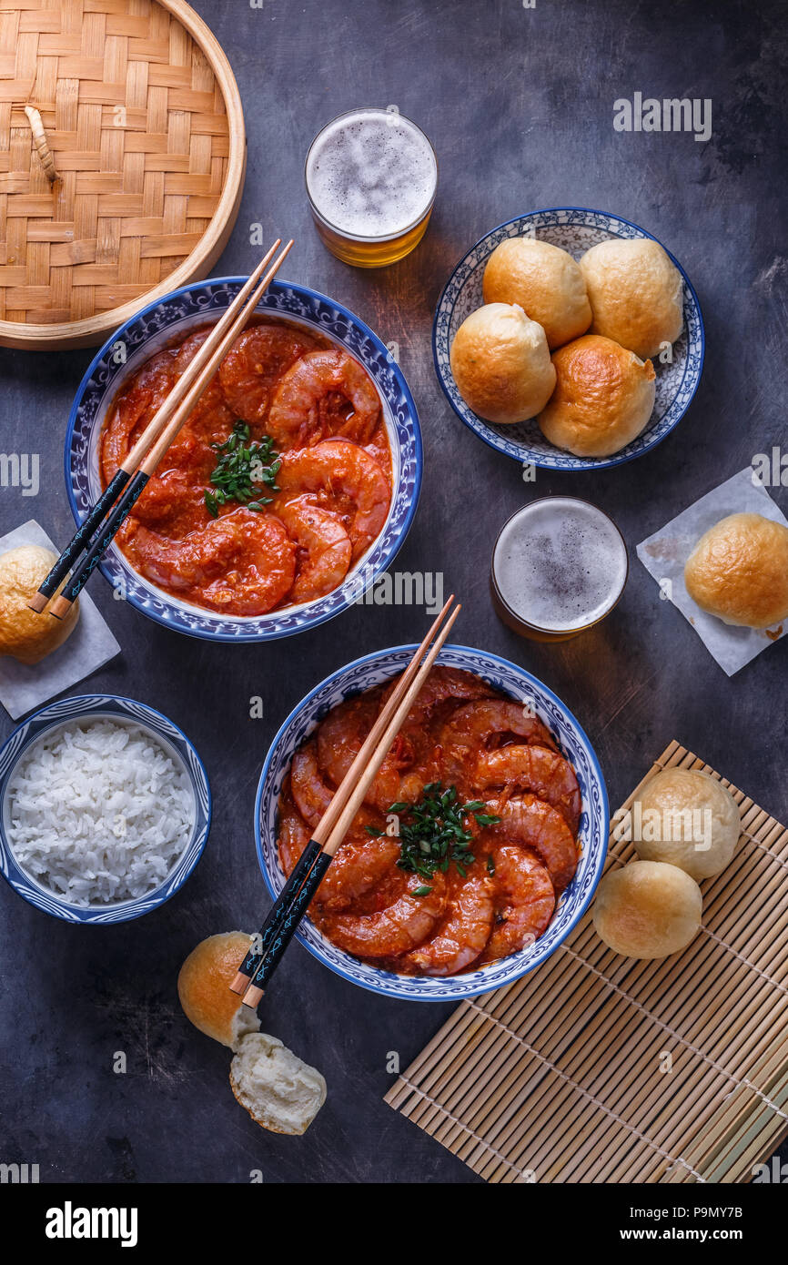 Shrimp in chili sauce with rice and beer Stock Photo