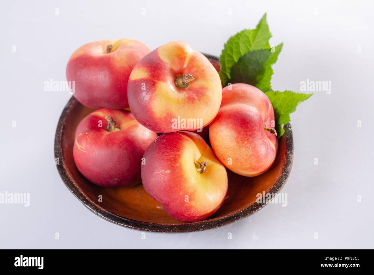 New hybrid sweet fruit nectarina platerina, flat Saturn or donut