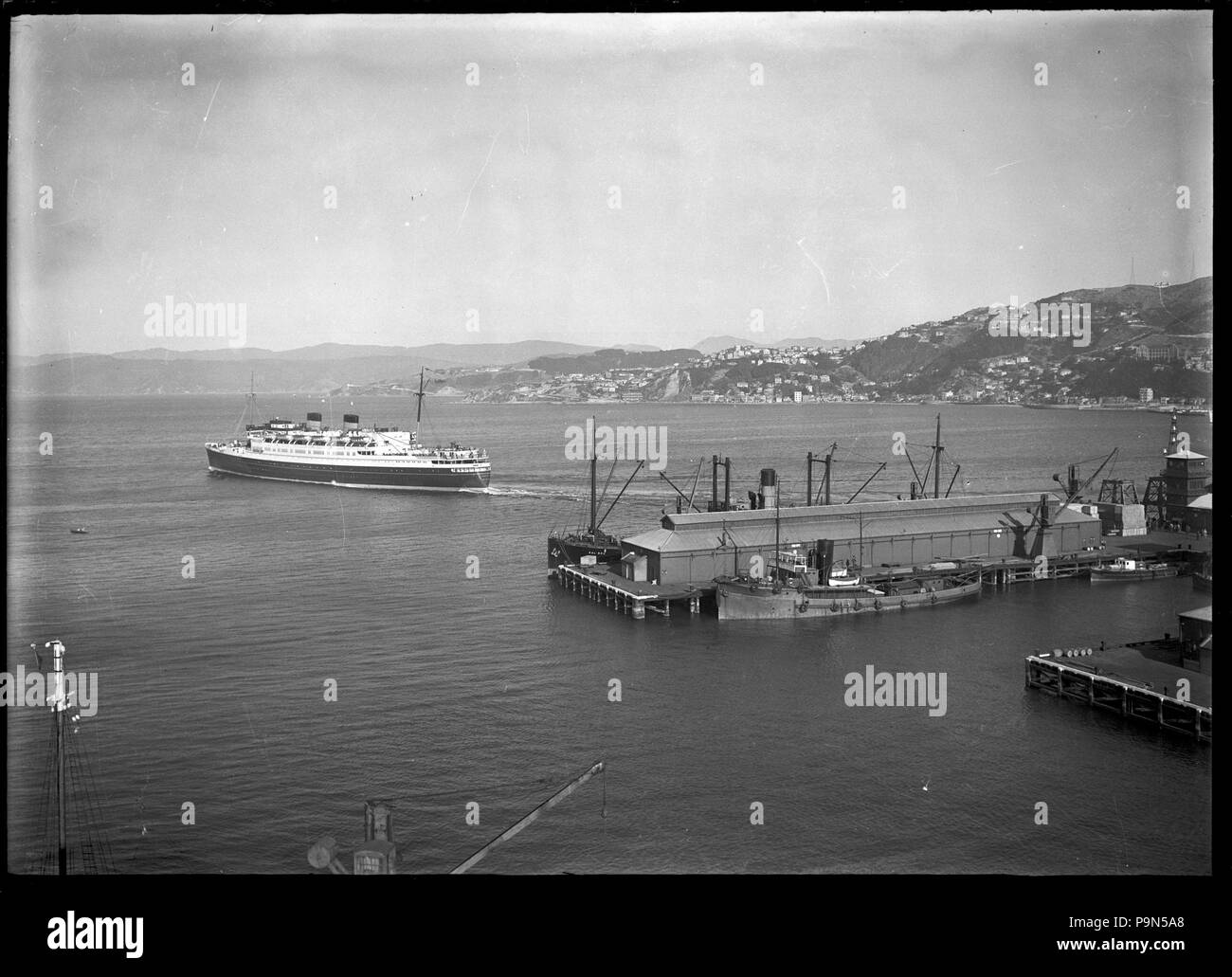 324 View of Wellington Harbour with the Awatea leaving the wharf ATLIB 327724 Stock Photo