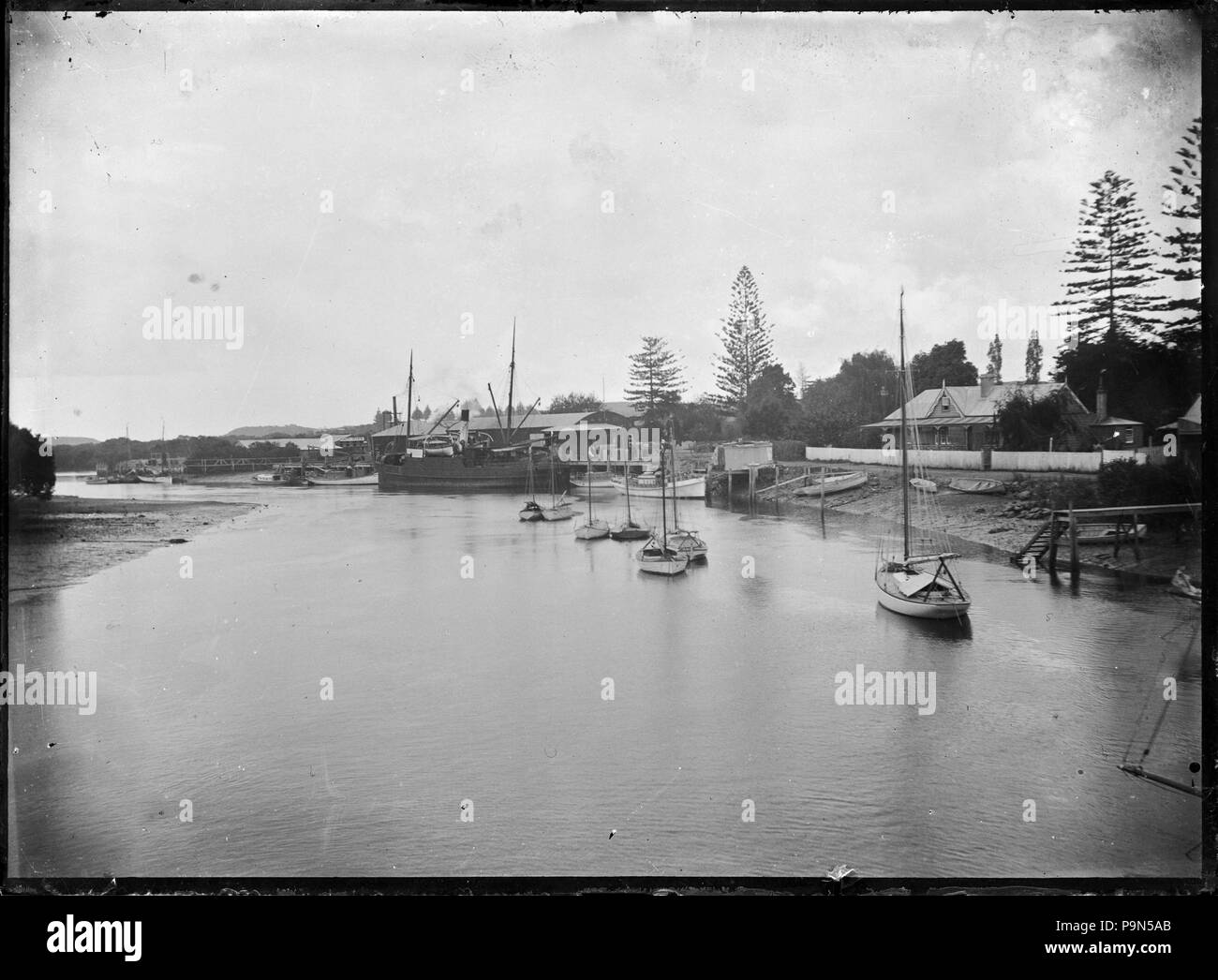 324 View of Whangarei showing part of the town, Hatea River, and the SS Kanieri berthed at the town wharf. ATLIB 287807 Stock Photo