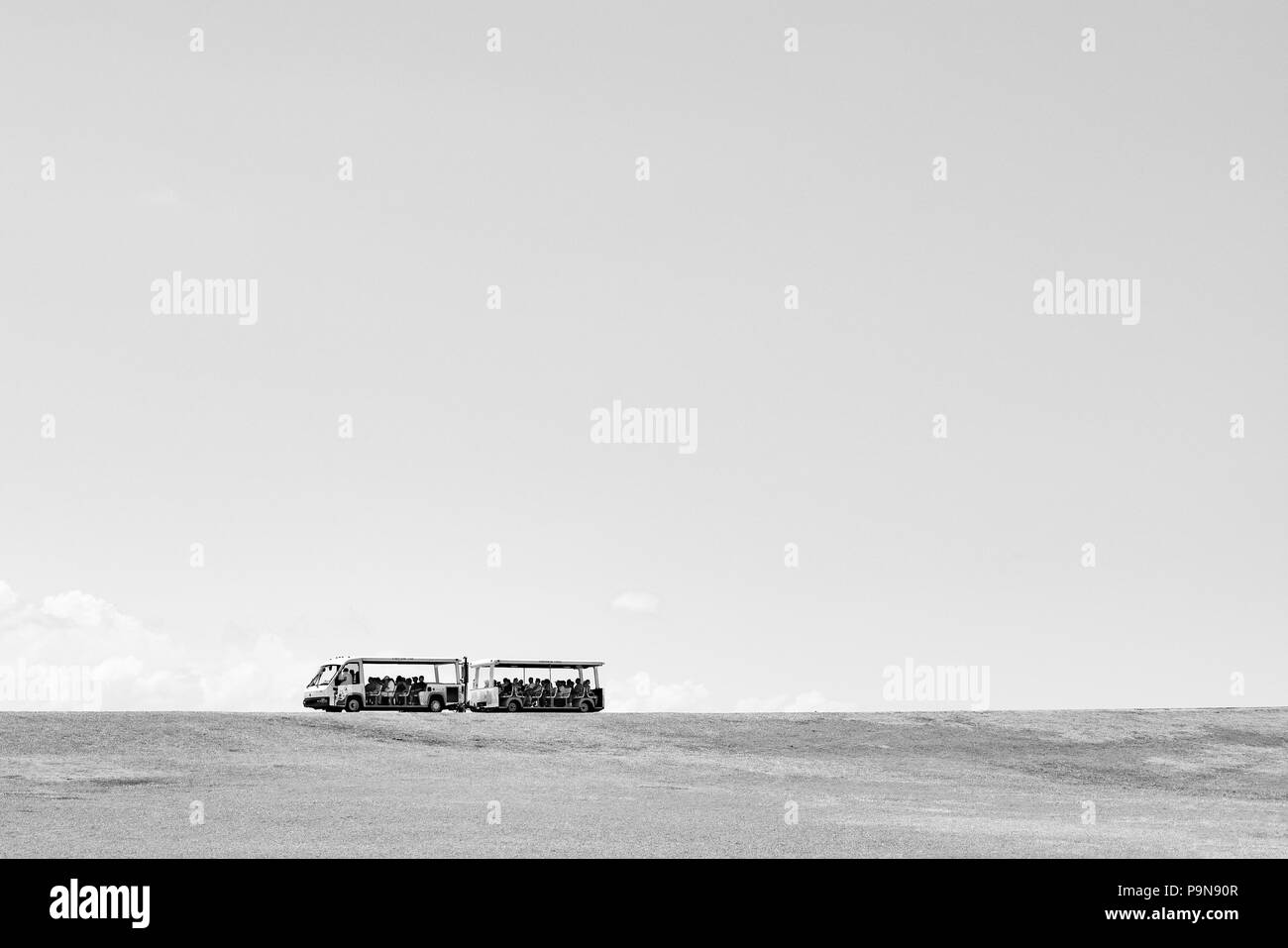 San Juan, Puerto Rico - April 02 2014: Trolley transporting tourists from Castillo San Felipe del Morro in Old San Juan, Puerto Rico. Stock Photo