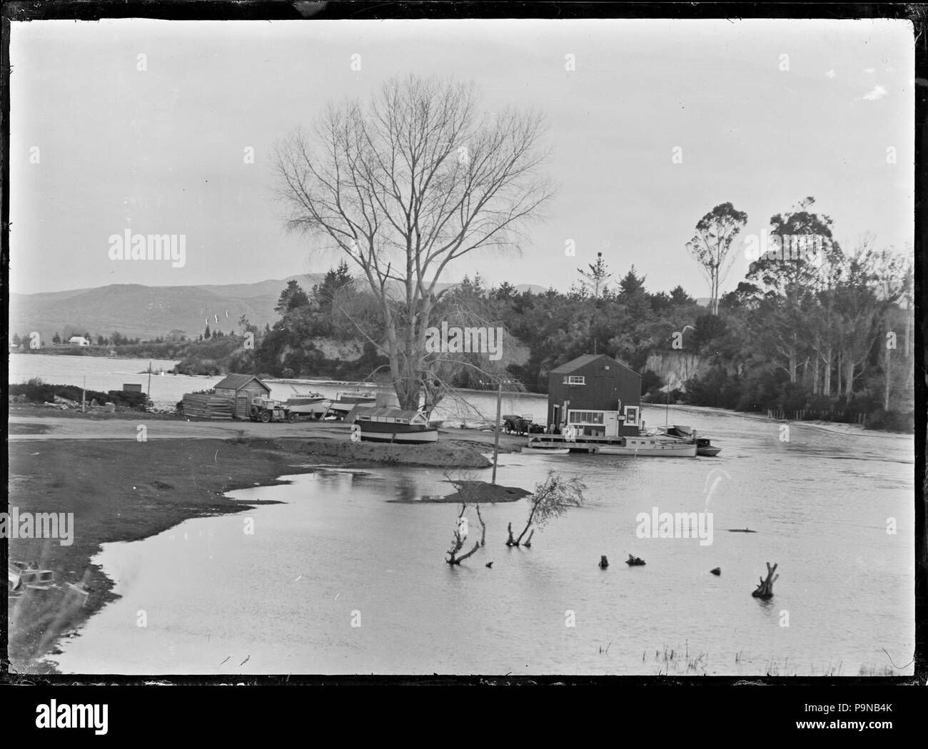 330 Wharf and small jetty on Lake Taupo at the point where the Waikato River leaves the lake ATLIB 313225 Stock Photo