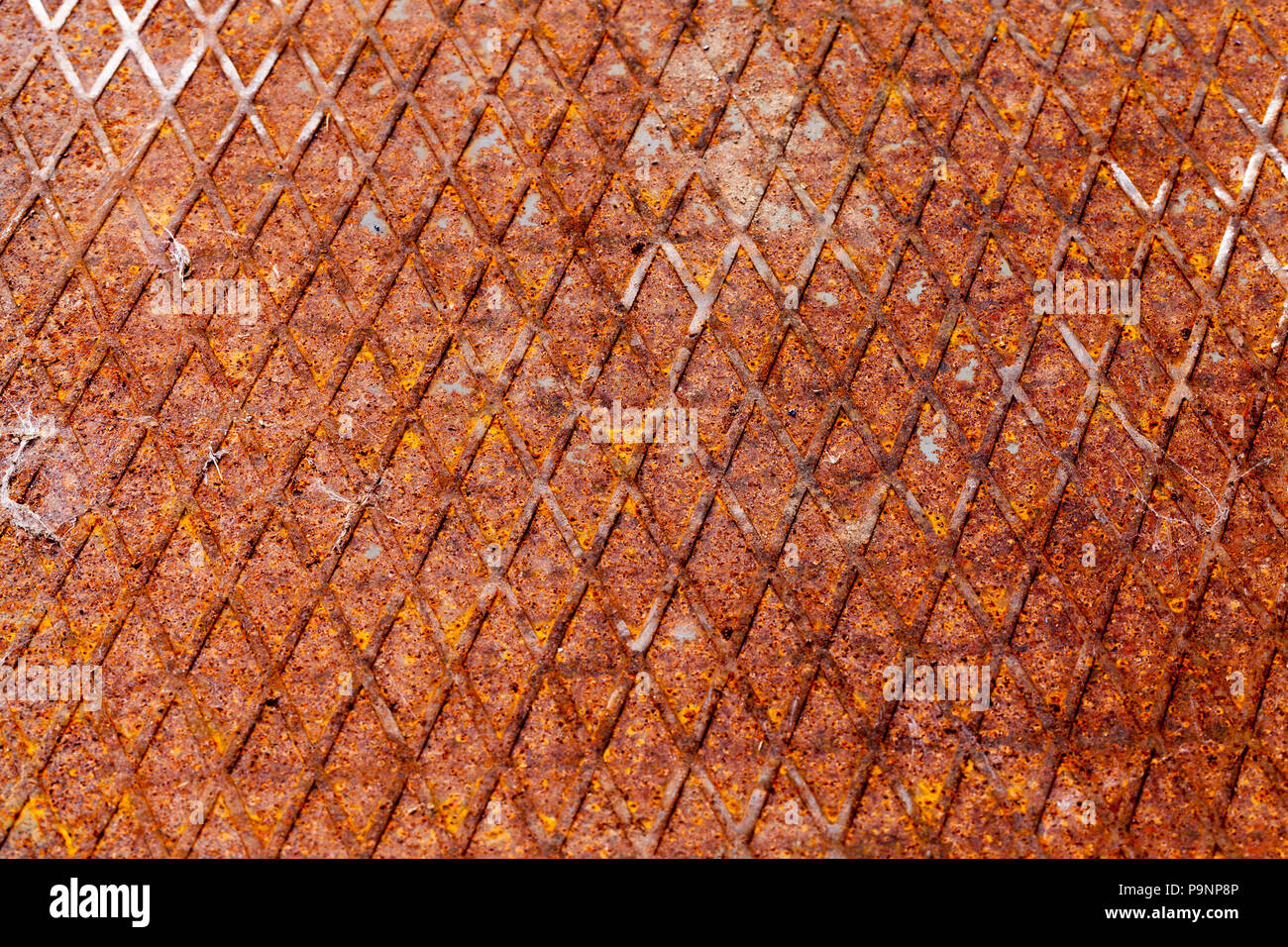 Rusted Ridge metallic background with ridge protrusions rusted and oxidized from the ...