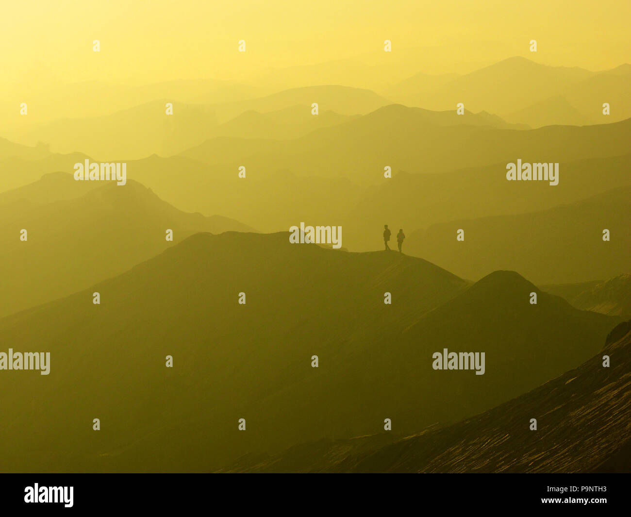 Beautiful Landscape of Bromo Tengger Semeru Park in a foggy sunrise Stock Photo