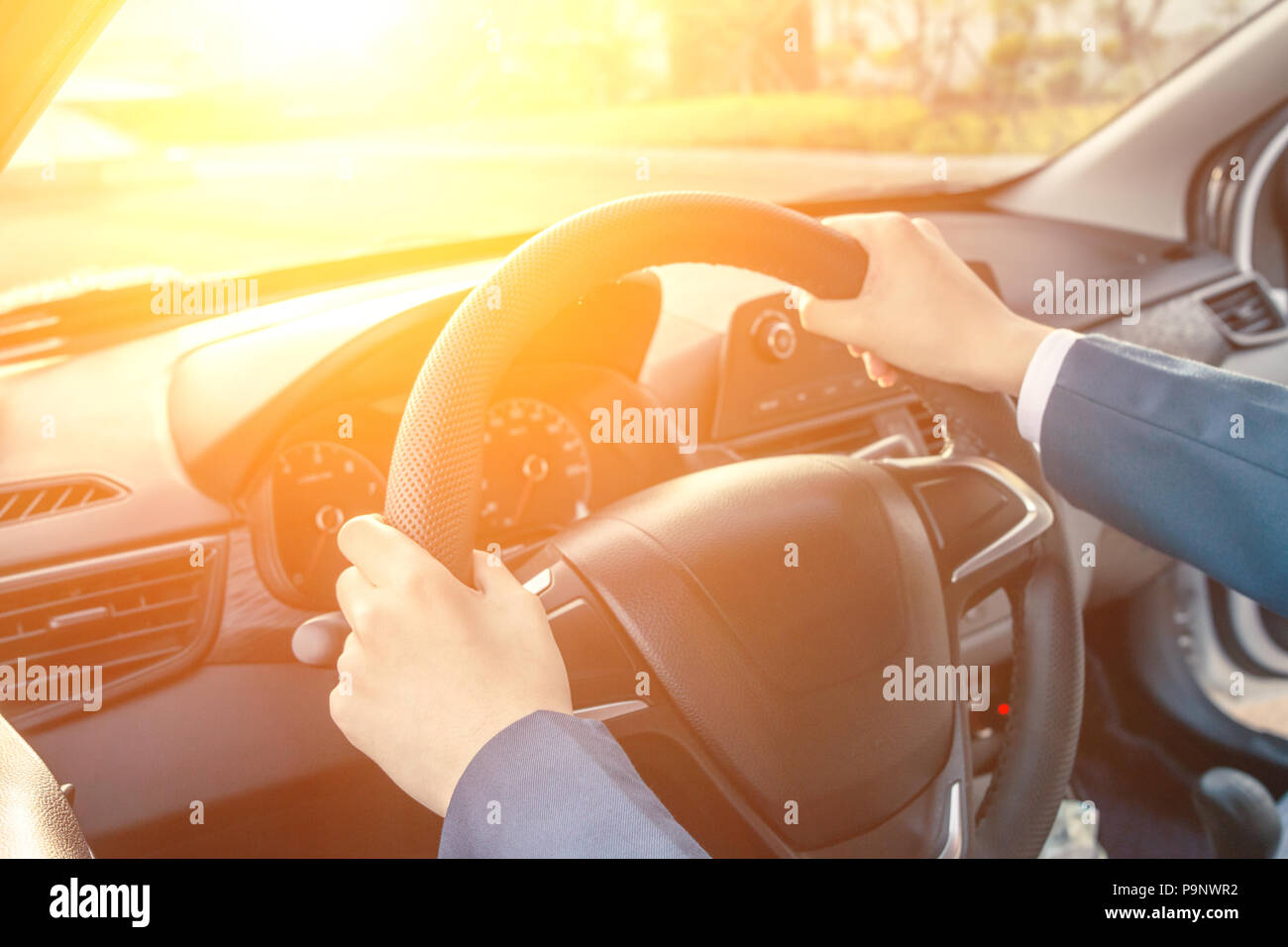 Hand of a black man driving hi-res stock photography and images - Alamy
