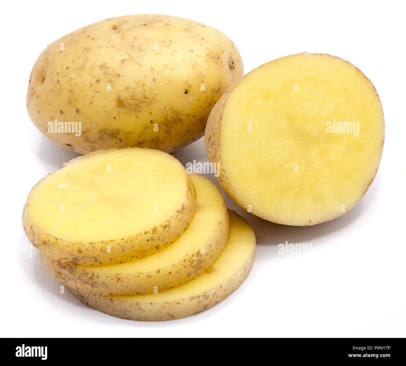 One whole, sliced potato and a half isolated on white background Stock Photo