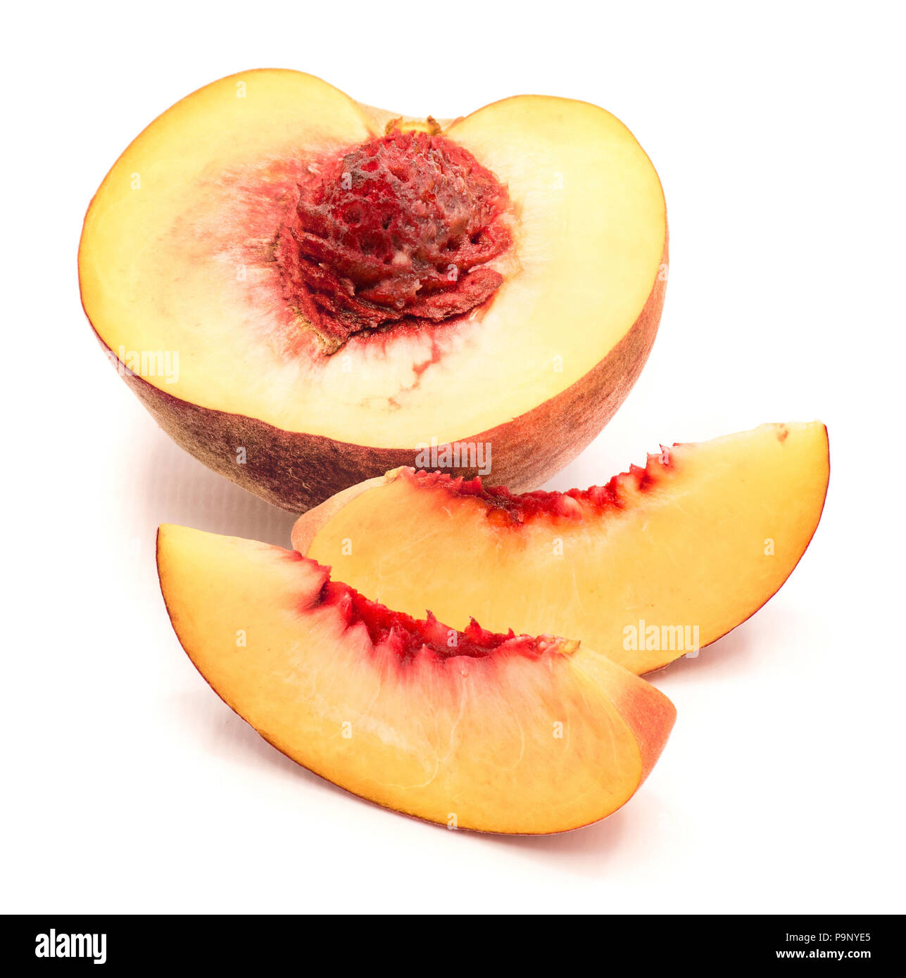 One Half With A Stone And Two Peach Slices Isolated On White Background Stock Photo Alamy