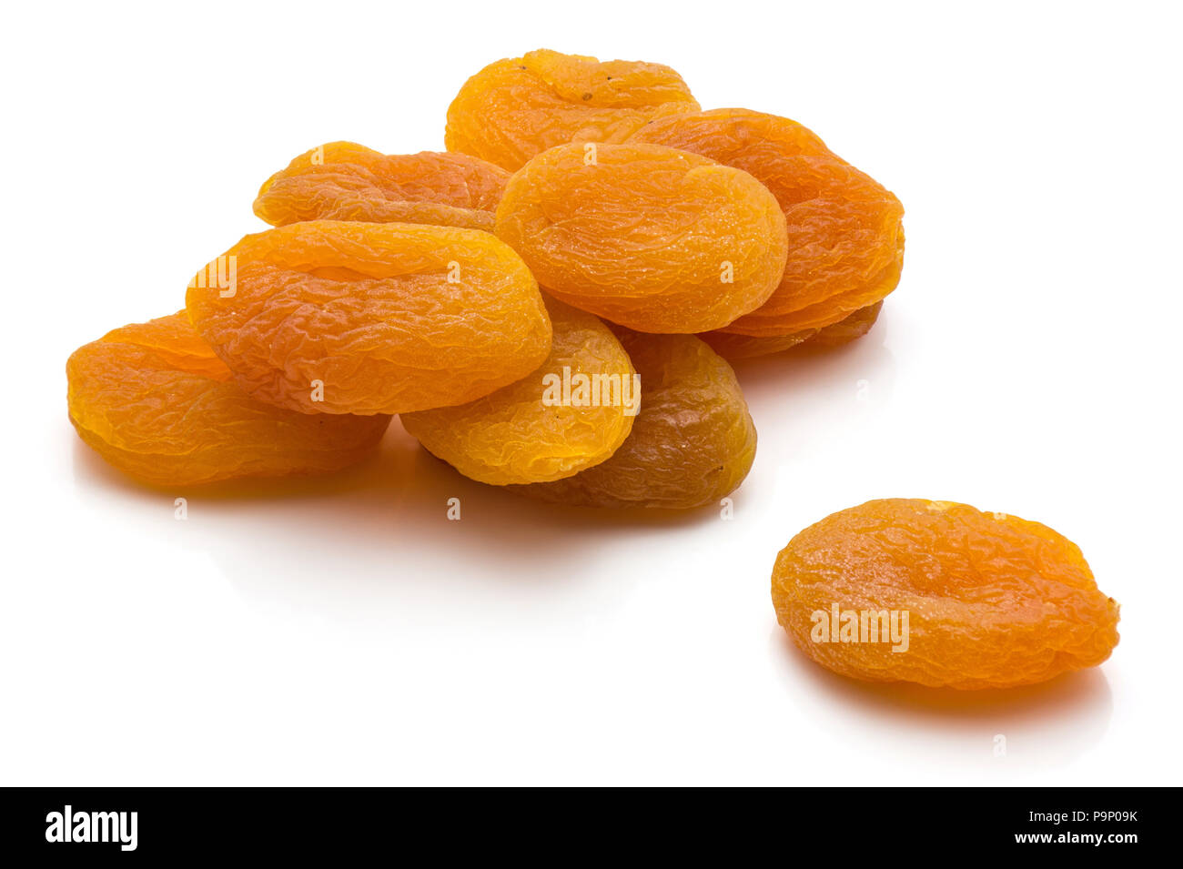 Orange dried apricots isolated on white background Stock Photo Alamy
