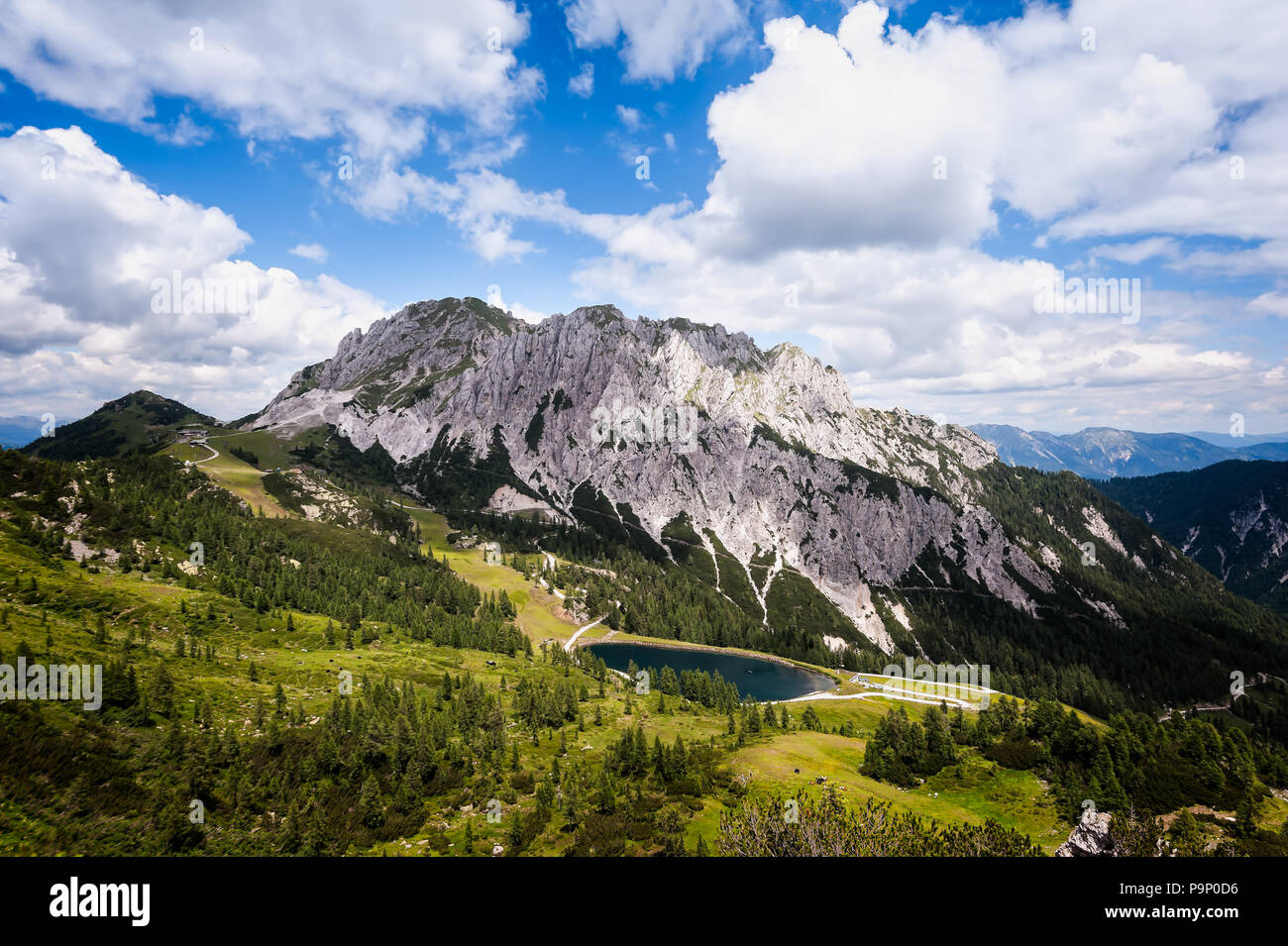 High angle panoramic view of the  Julian alps in summer, as seen from passo Pramollo on the border between Italy and Austria. Mountain Landscape. Stock Photo
