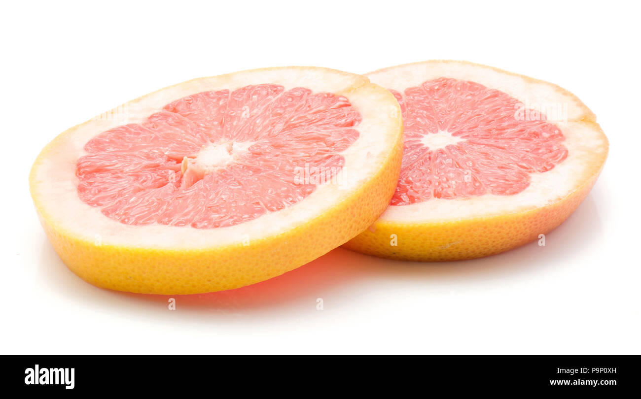 Two red grapefruit ring slices isolated on white background Stock Photo