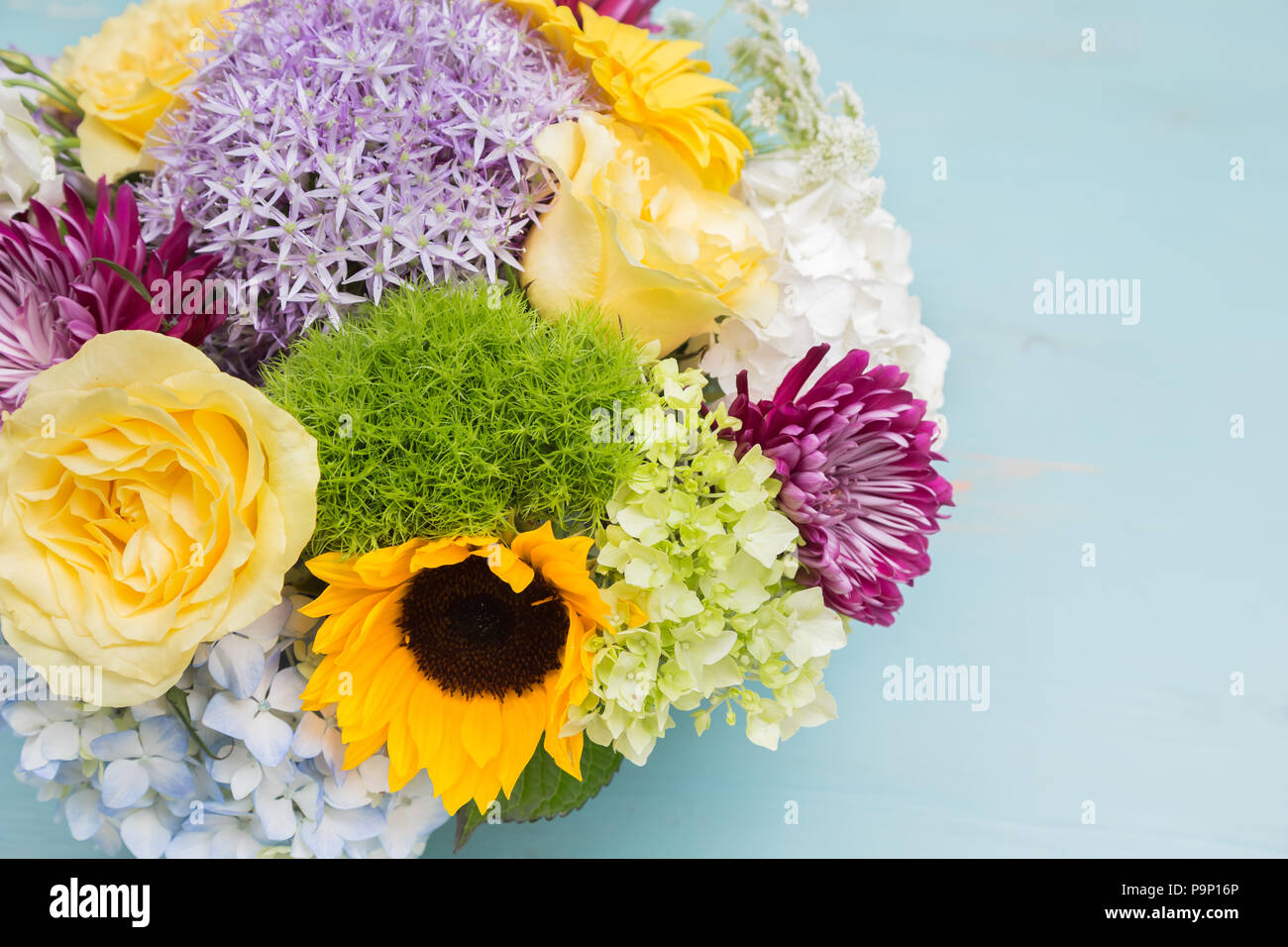 An arrangement of many different types of flowers hi-res stock ...