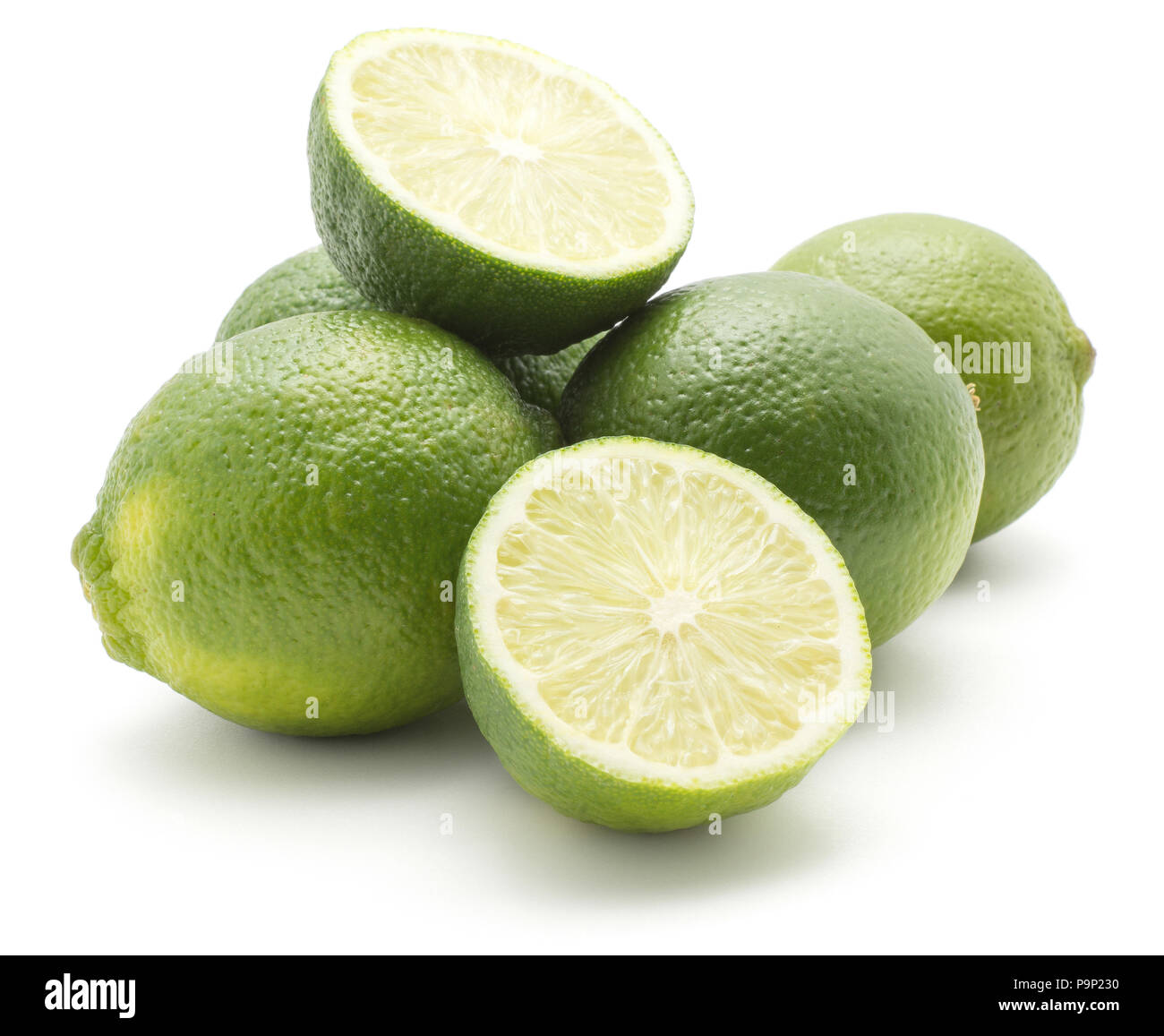 Limes group of our whole and two halves isolated on white background