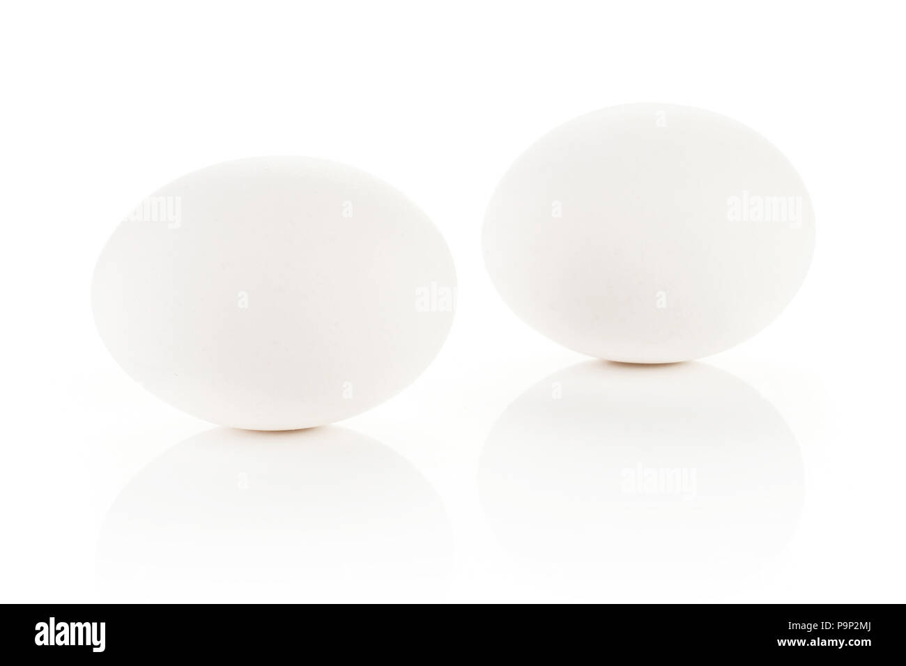 White chicken eggs two fresh isolated on white background Stock Photo ...