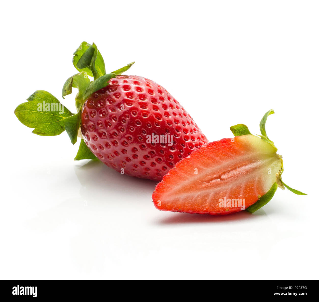 One garden strawberry and one fresh cut half isolated on white background Stock Photo