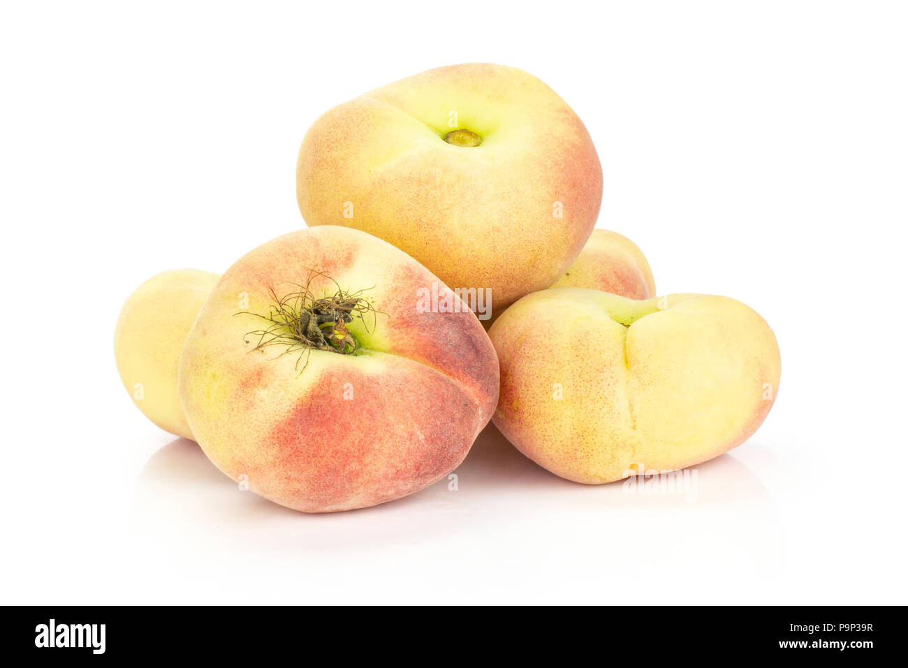 Fresh Saturn peaches isolated on white background Stock Photo