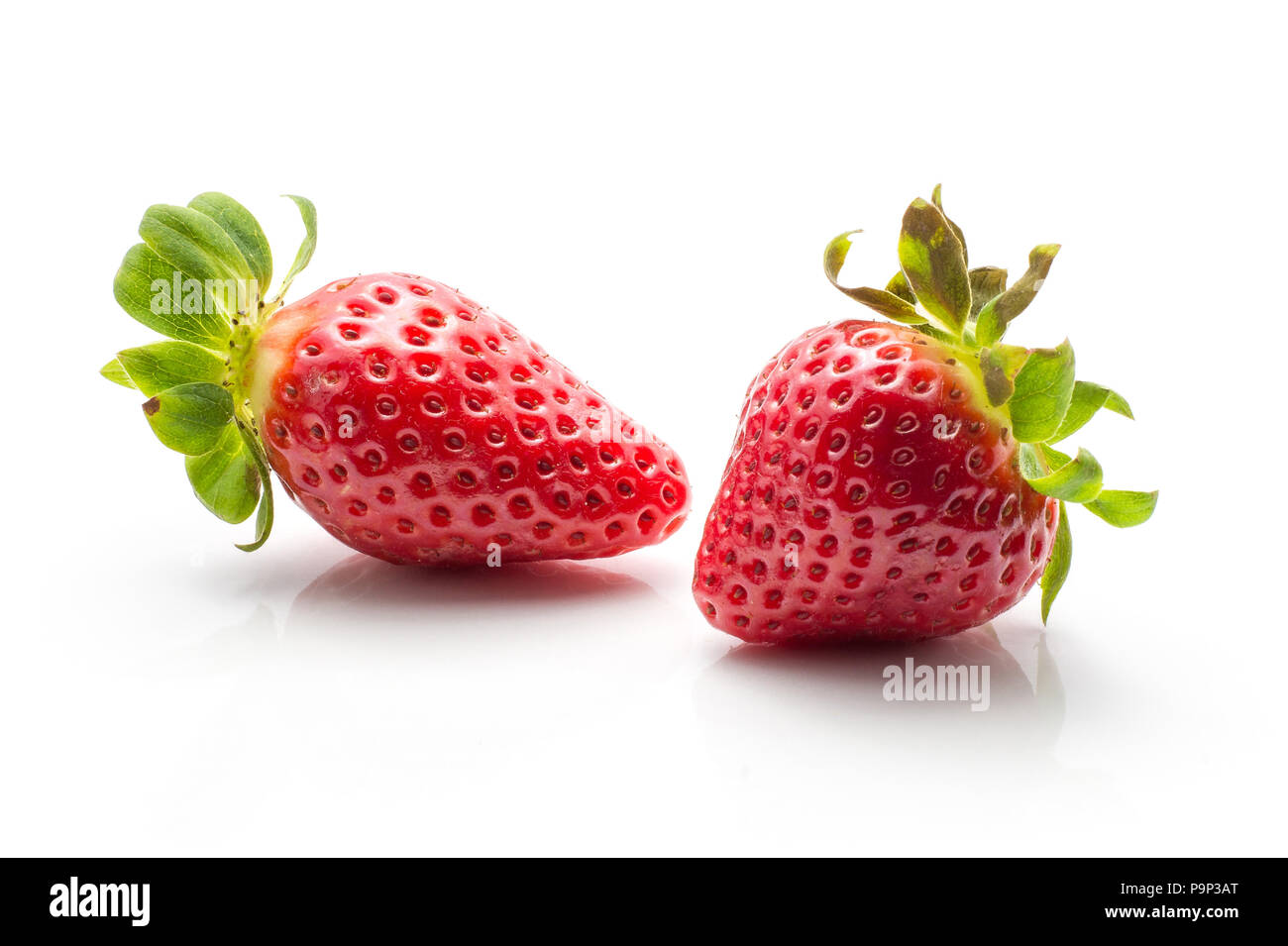 Two garden strawberries isolated on white background ripe and fresh Stock Photo