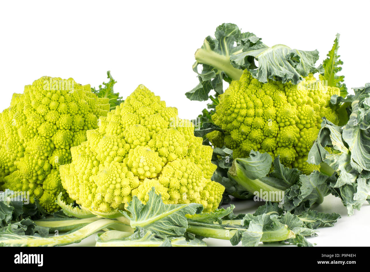 Romanesco cauliflower or broccoli isolated on white background three
