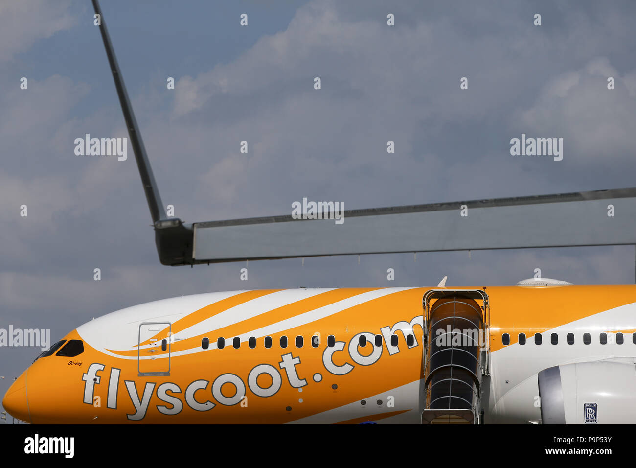 The Boeing 787-9 civil jet airpane of Scoot longhaul lowcost carrier at the Singapore Airshow at Changi exhibition center in Singapore. Stock Photo