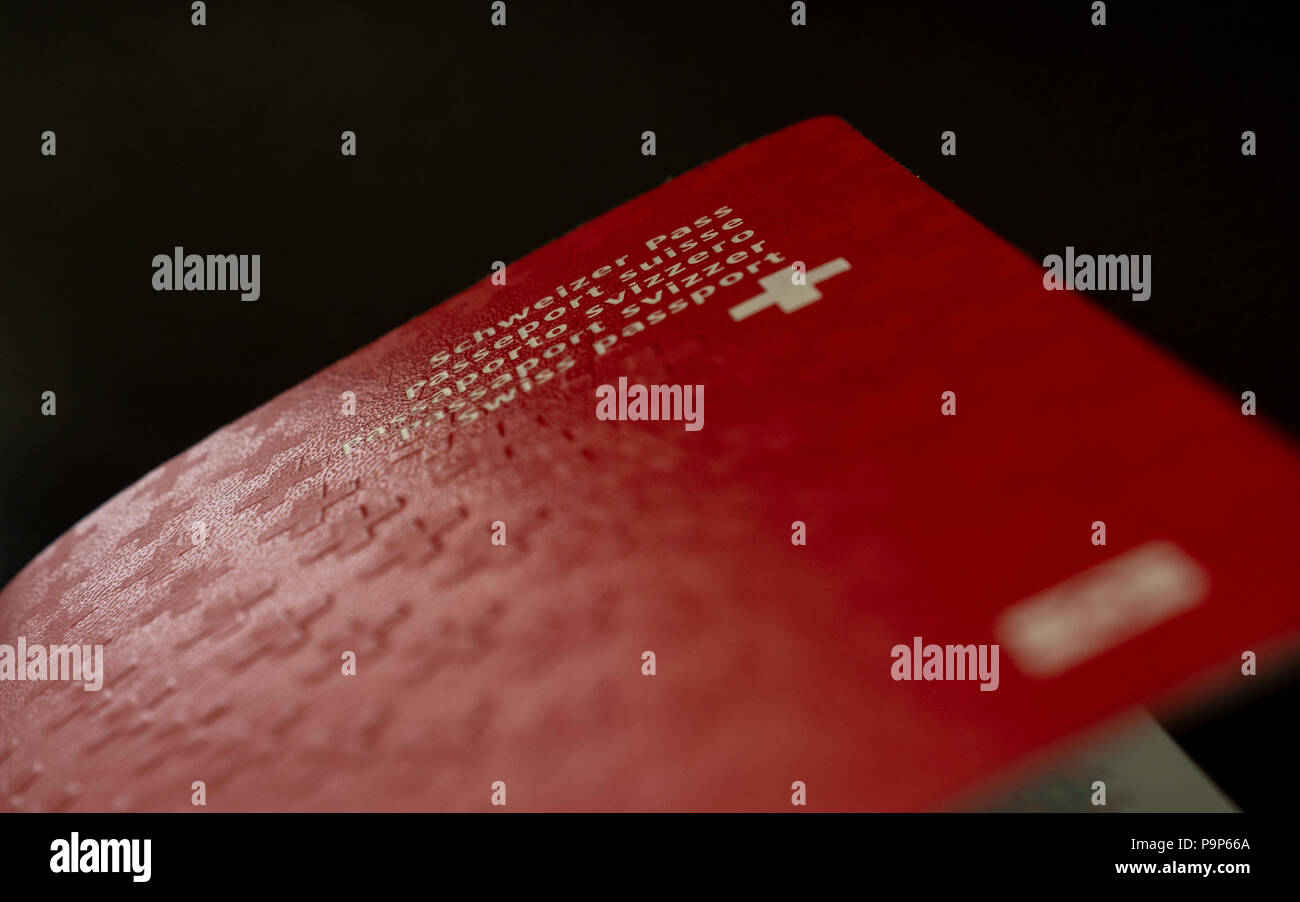 swiss passport close up on black background isolated switzerland